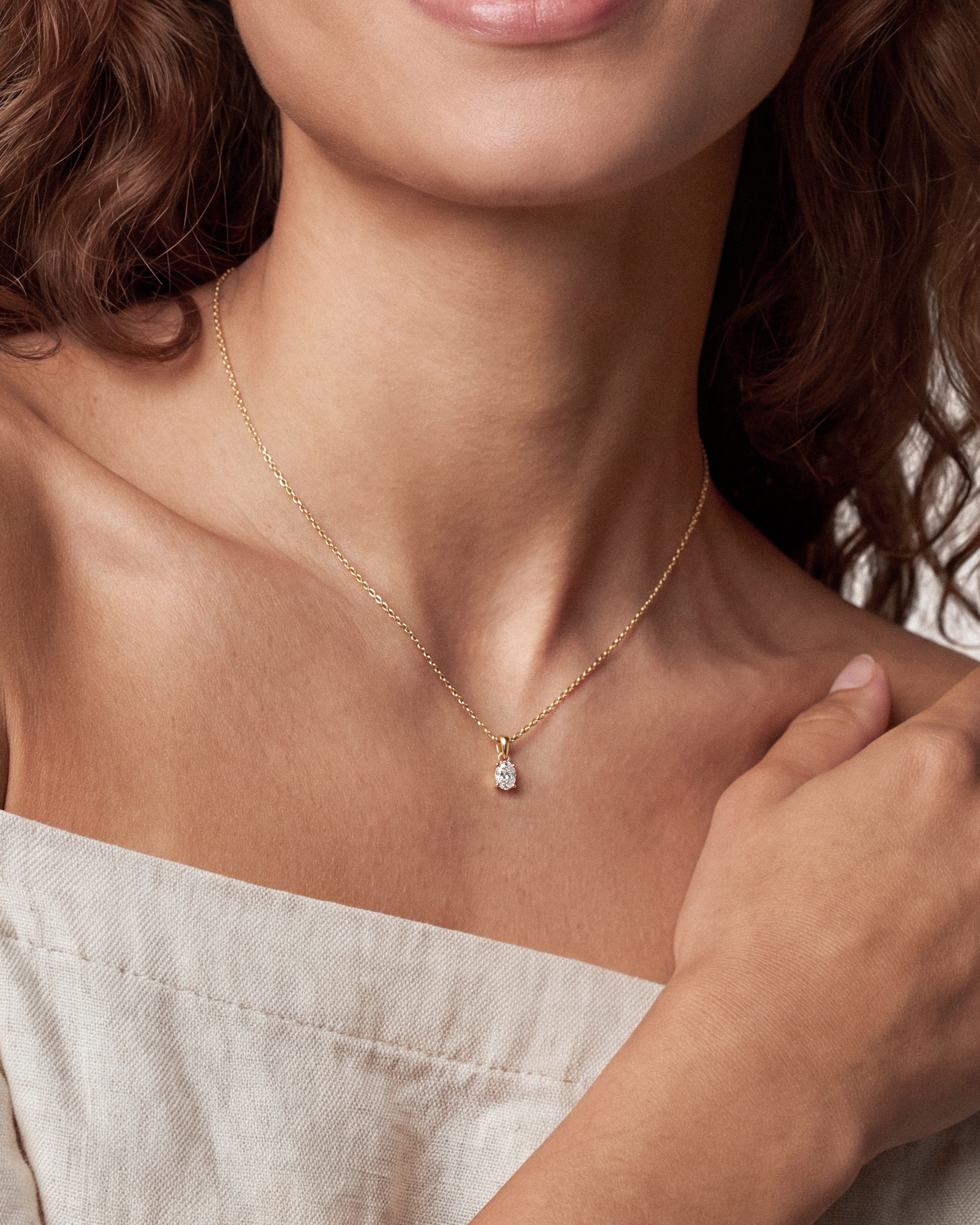 Oval Cut Solitaire Pendant (0.50 CT)