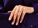 Diamond eternity ring on a hand, jewelry photography