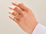 Diamond eternity ring on a woman's hand, fine jewelry