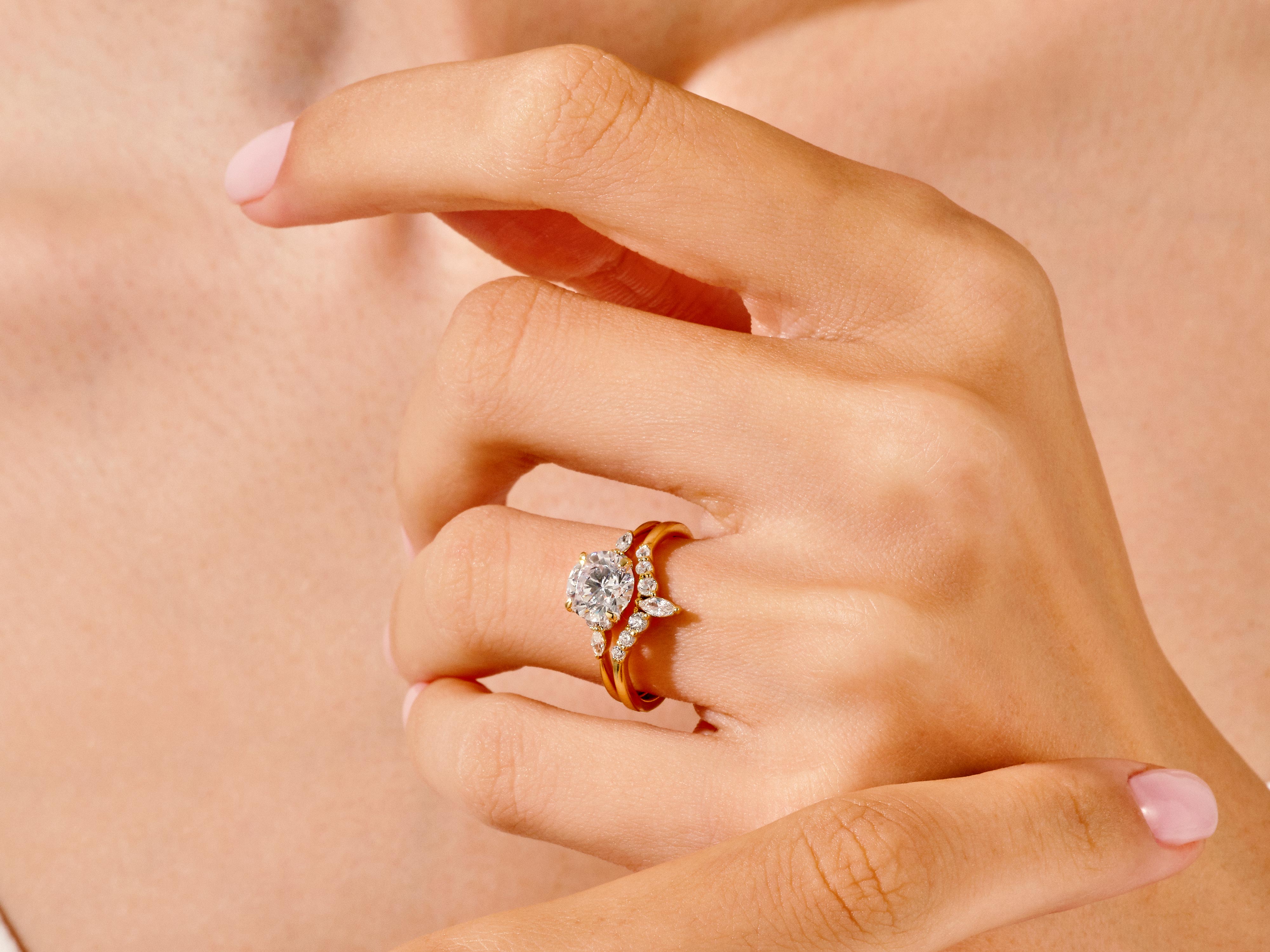 Diamond engagement rings on a woman's hand