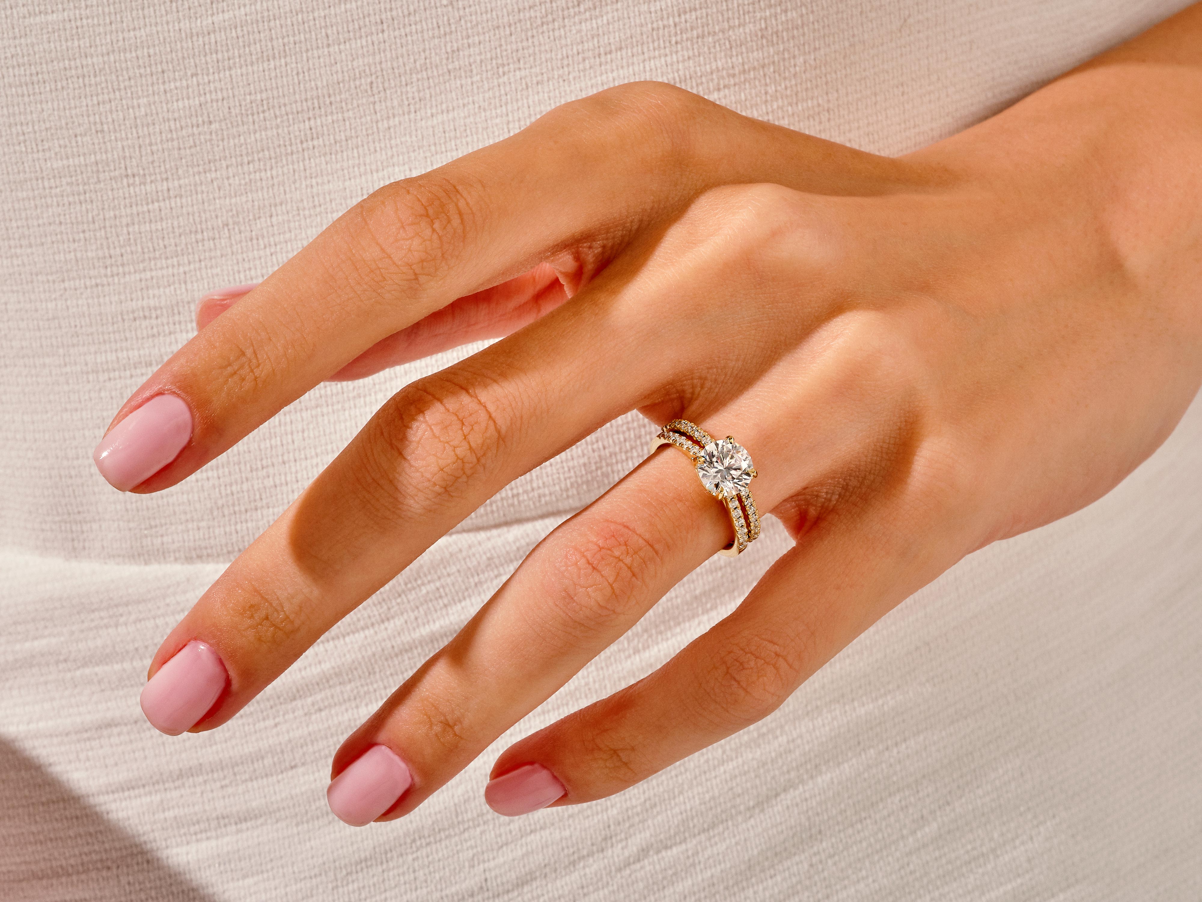 Diamond engagement ring on a woman's hand, luxury jewelry