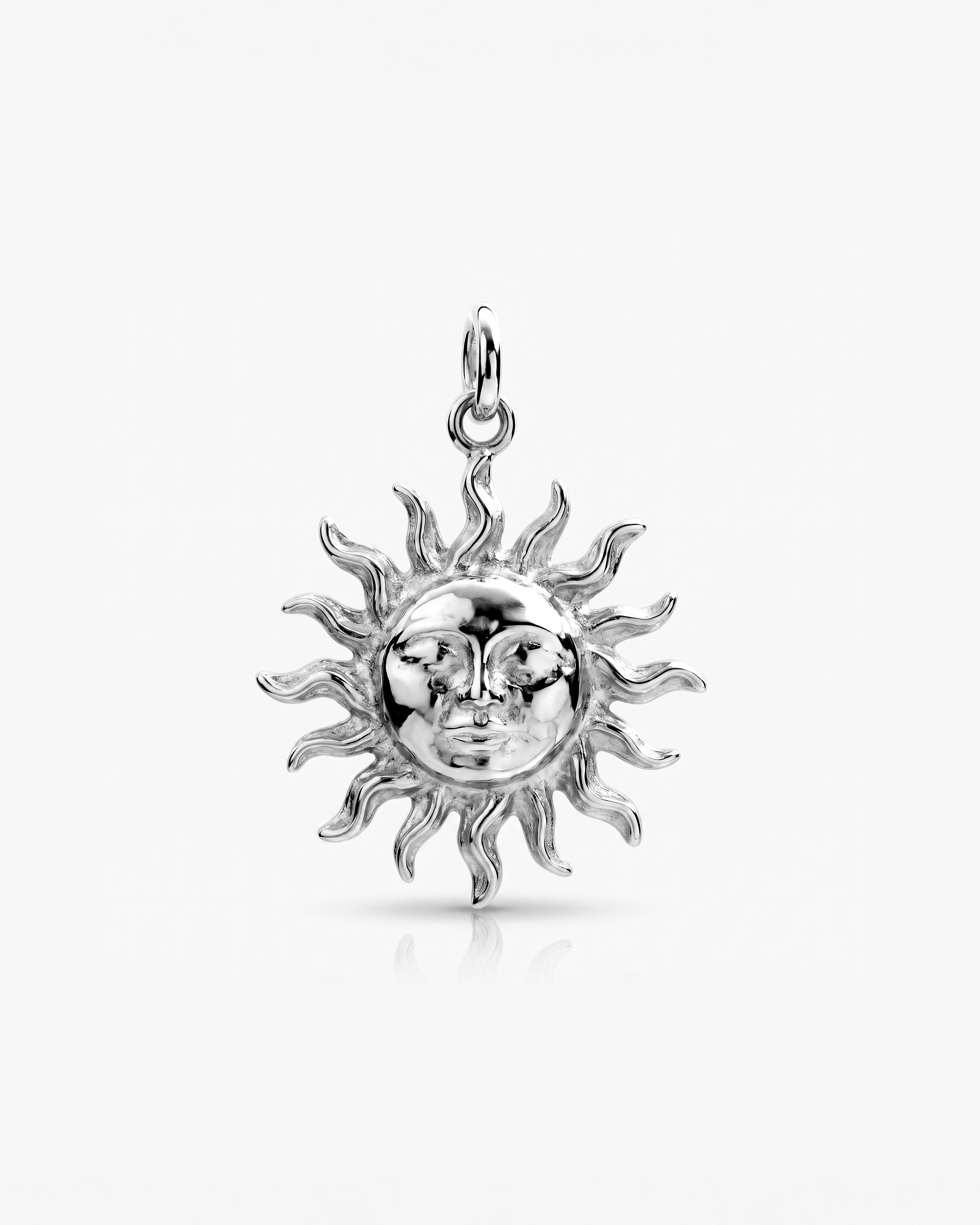 Sunface Charm in white gold and silver