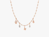 Rose gold necklace with diamond charms and initial pendants