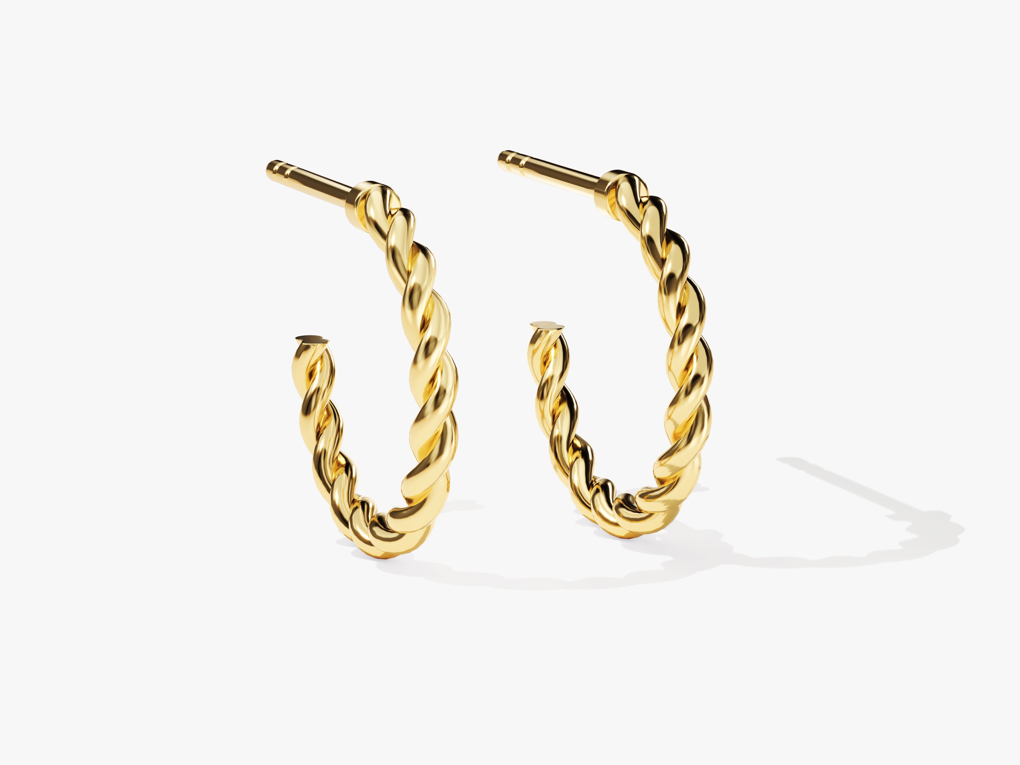 Gold twisted hoop earrings for jewelry collection