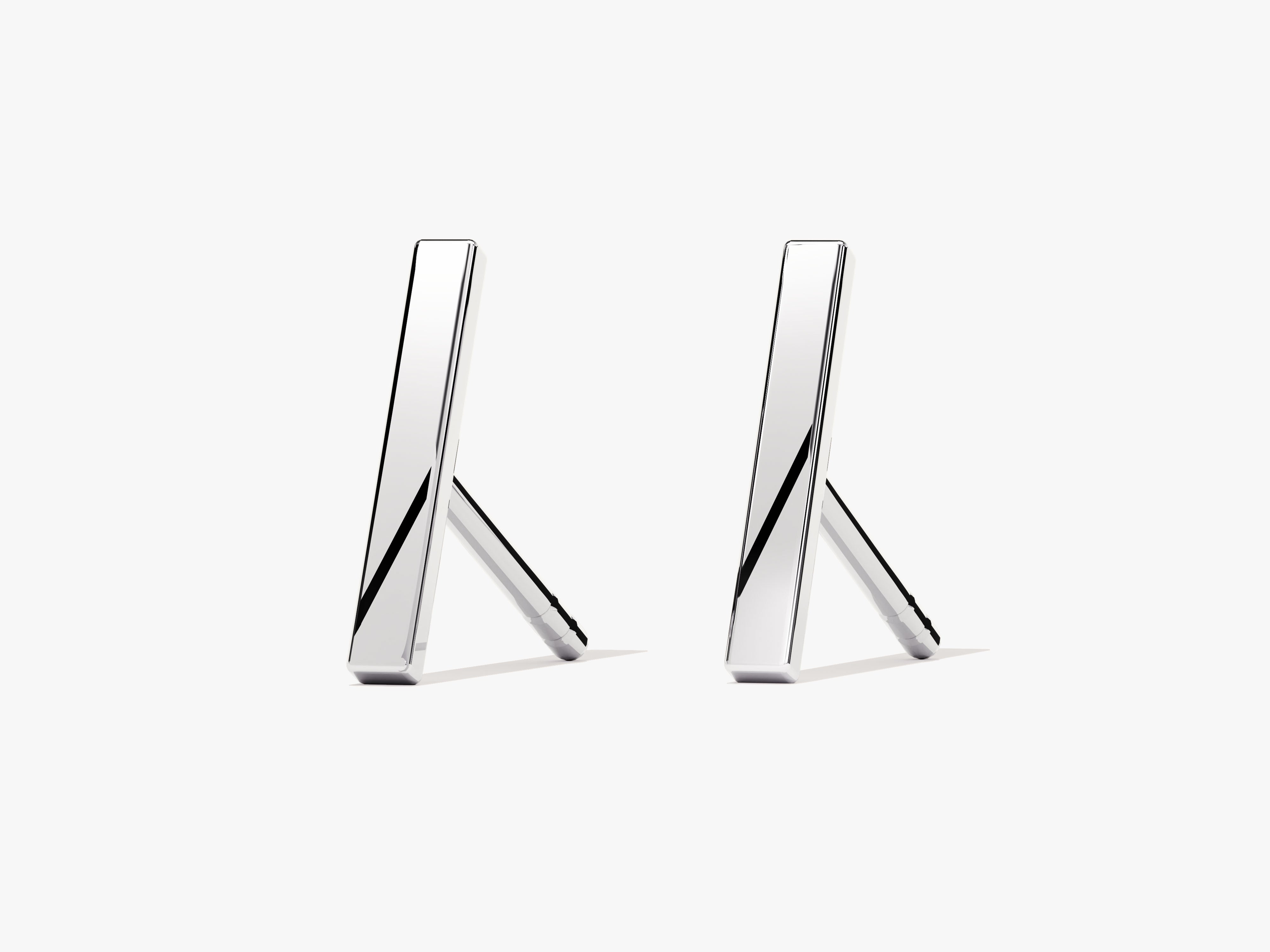 Pair of sleek, modern silver earrings for jewelry firm