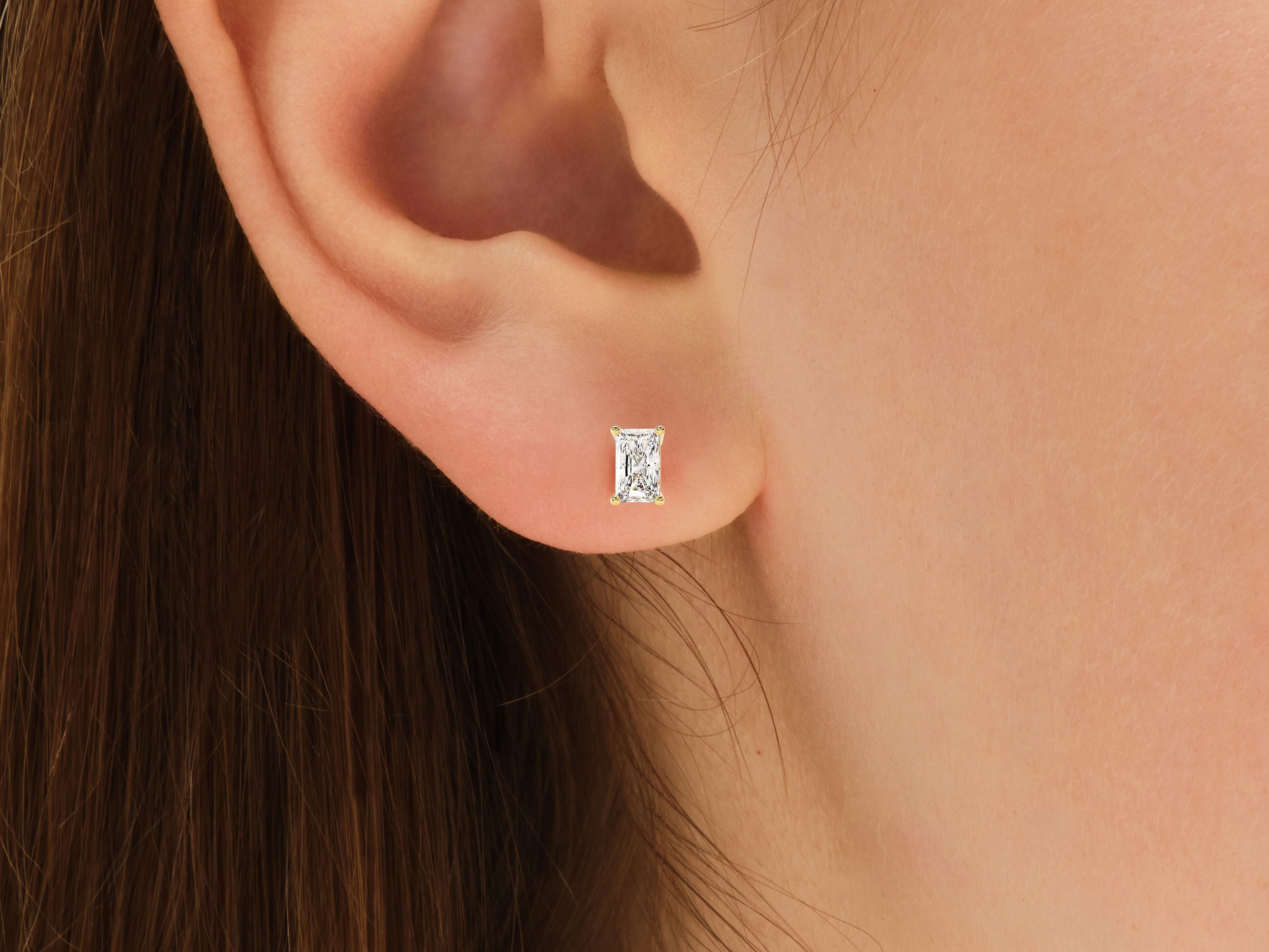 Diamond stud earring on ear, jewelry for women