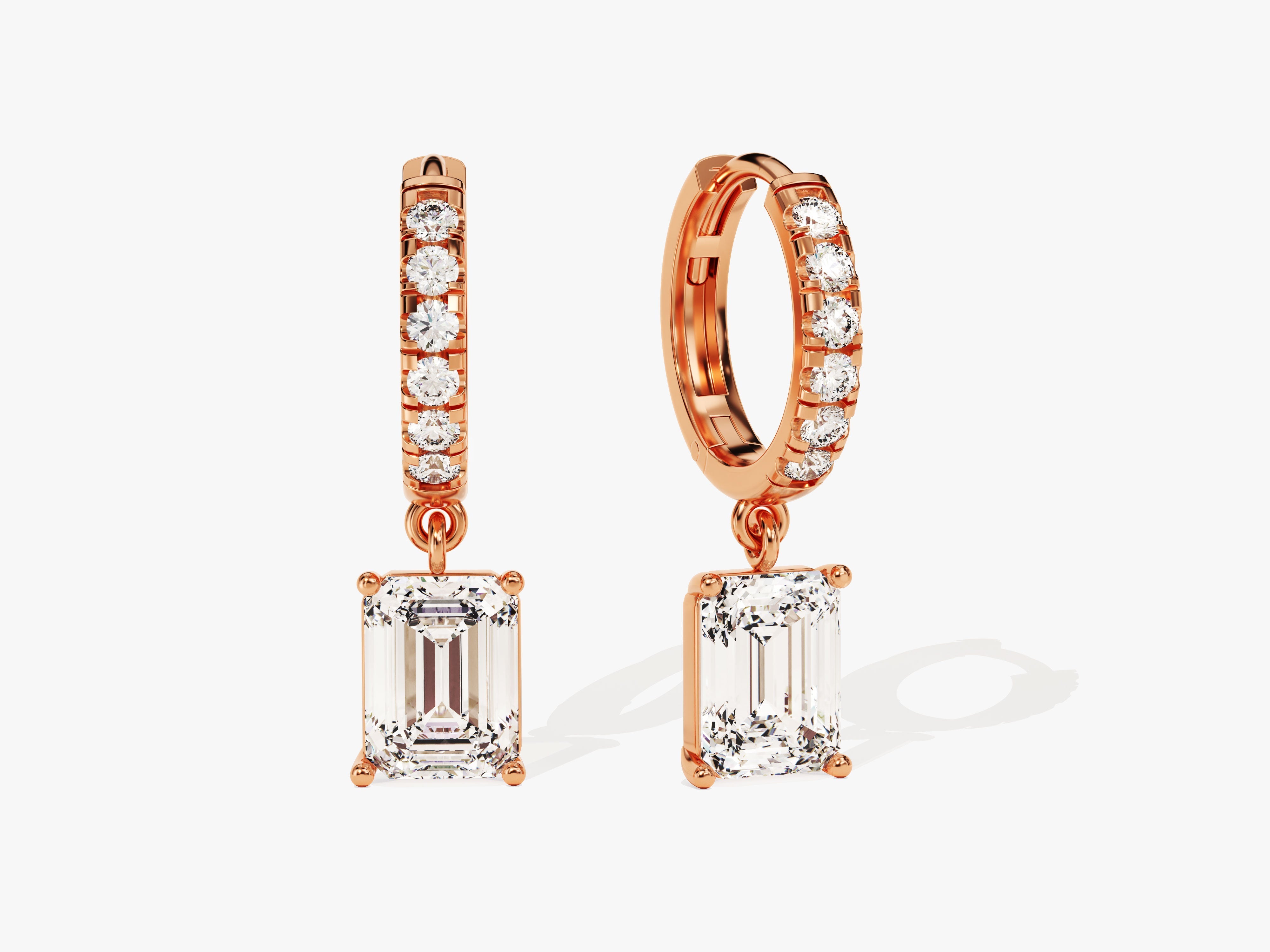 Rose gold diamond earrings with emerald cut drop pendants