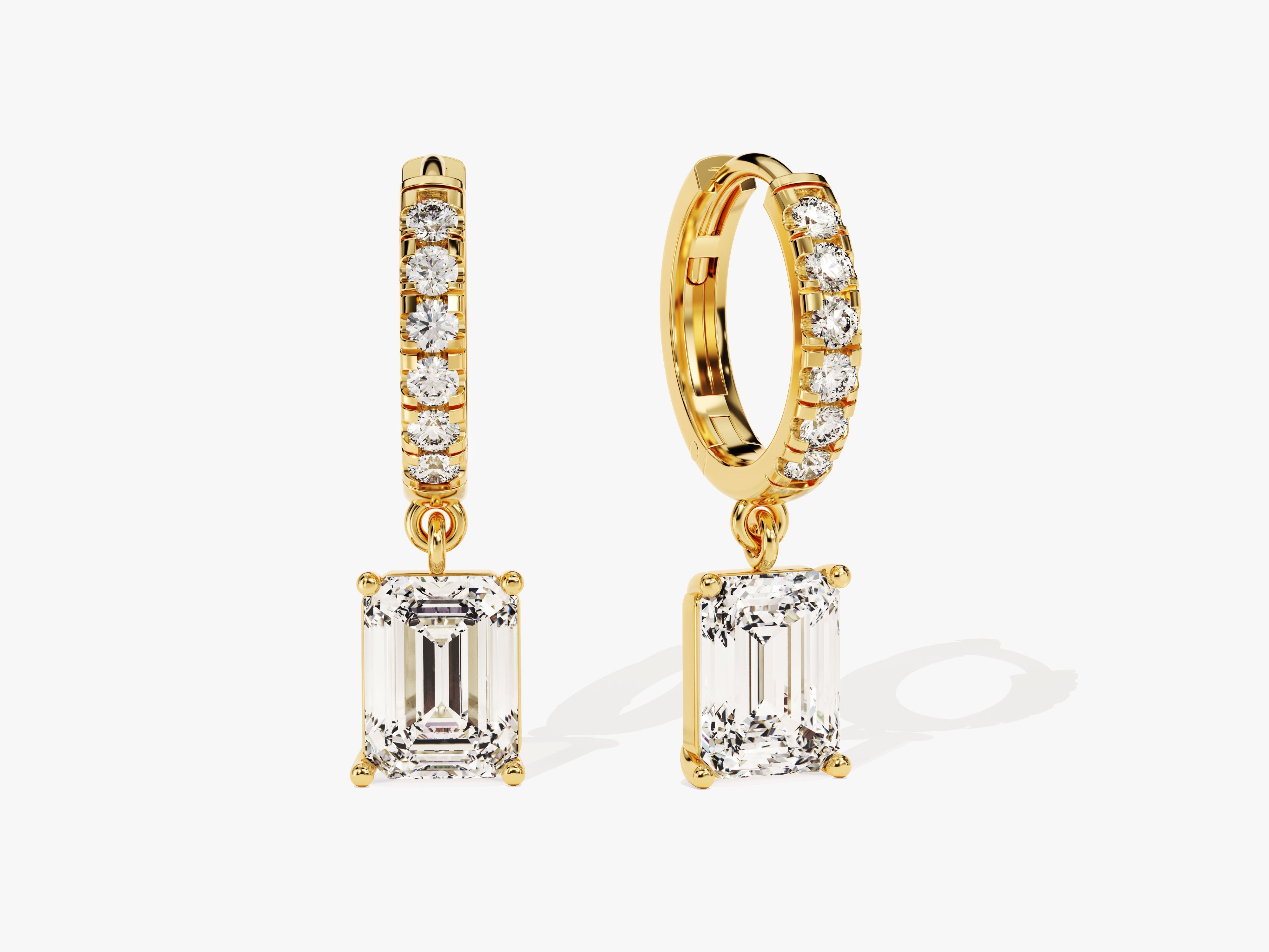 Gold hoop earrings with emerald-cut diamond drop pendants