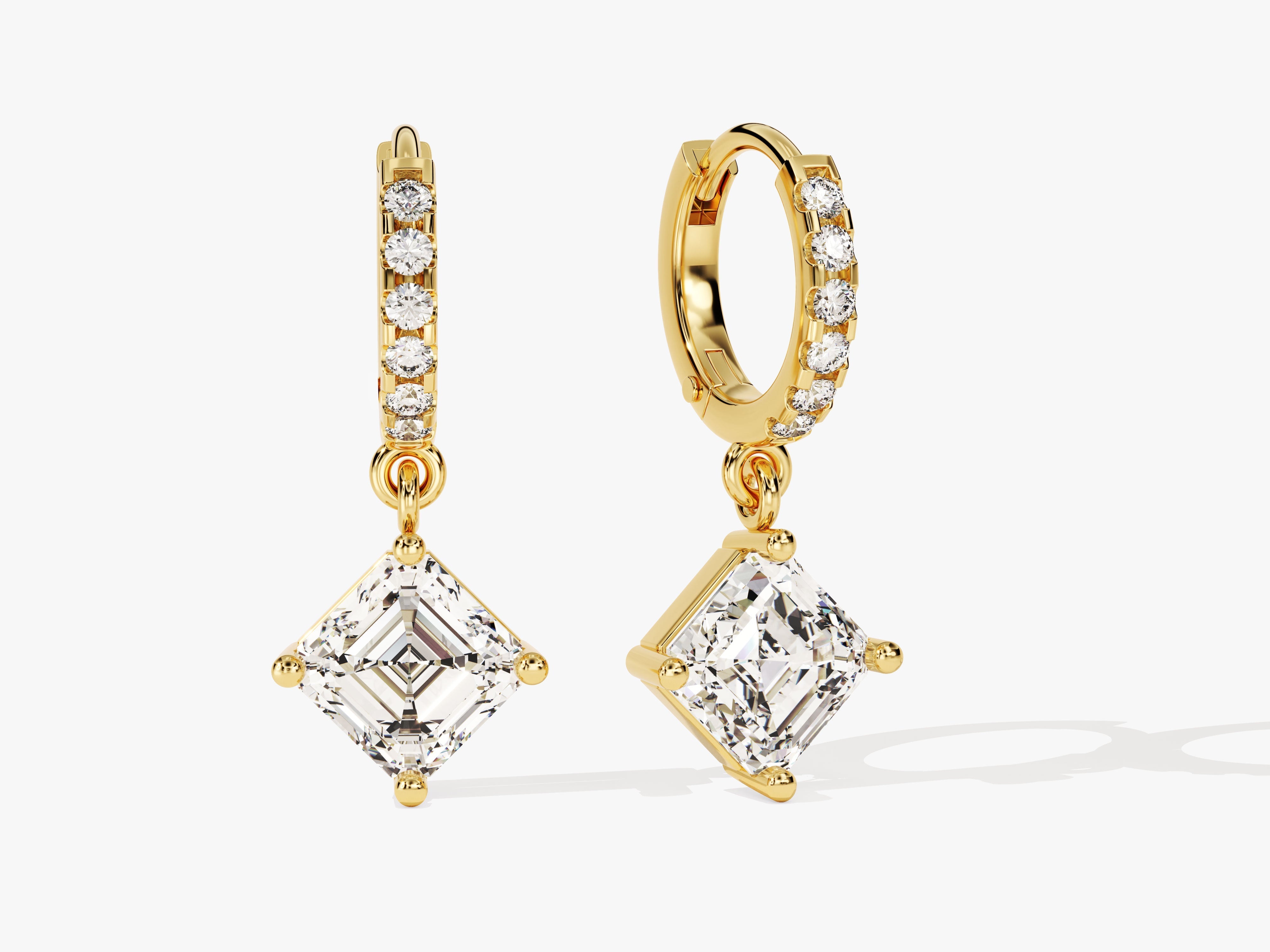 Gold diamond earrings with square cut gemstones