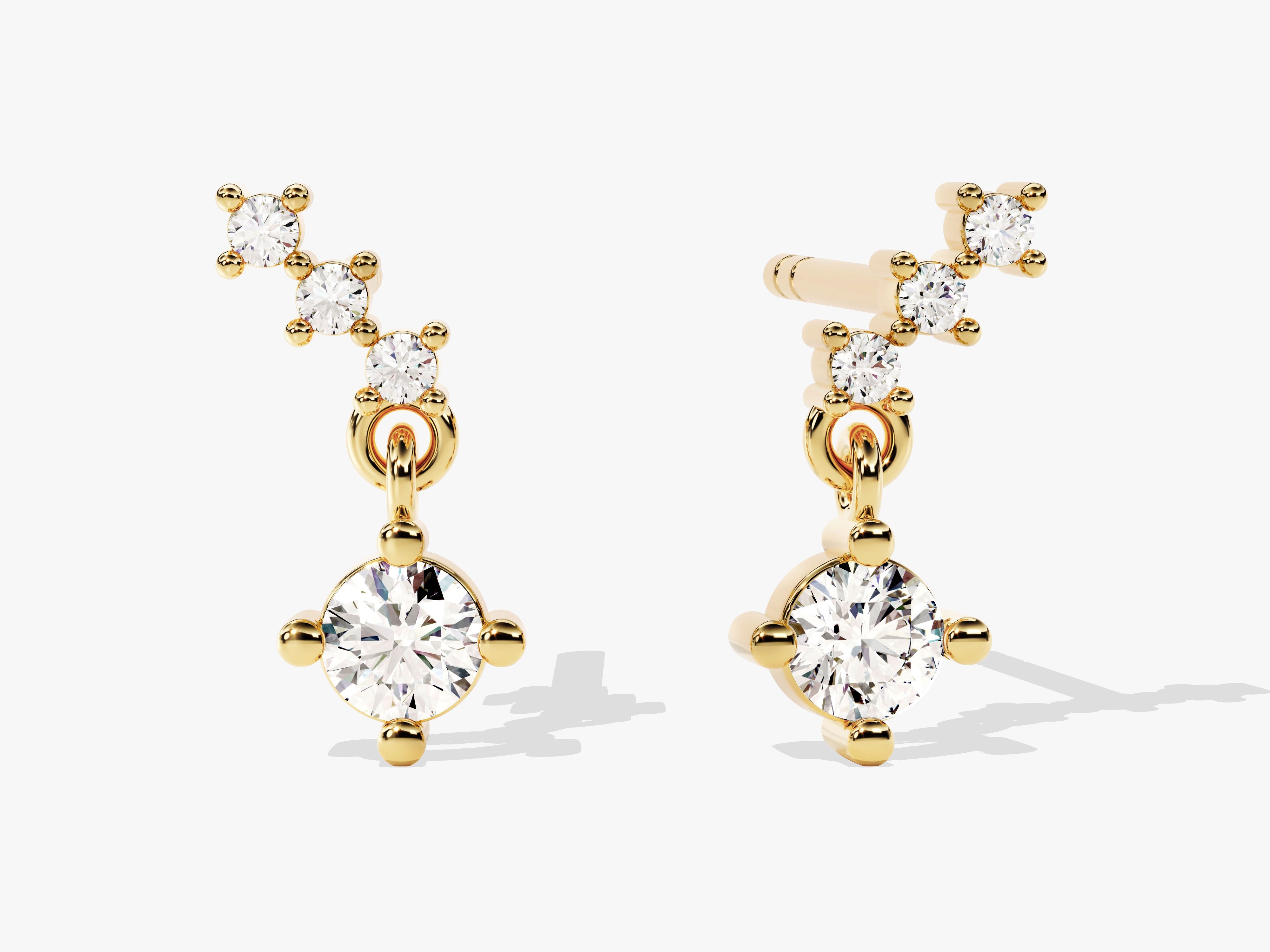 Gold diamond earrings with dangling solitaire gemstone