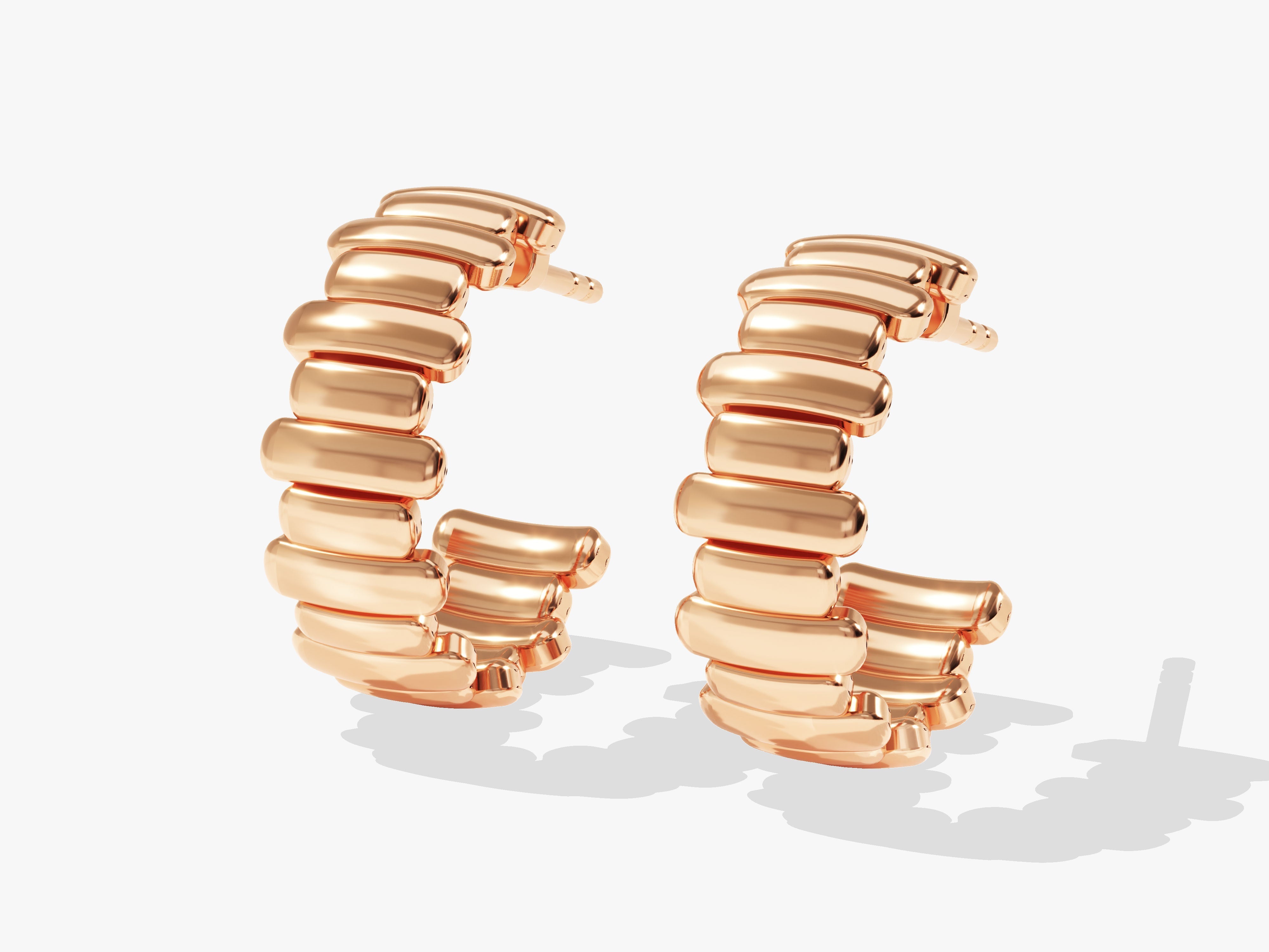 Rose gold hoop earrings with segmented design, luxury jewelry