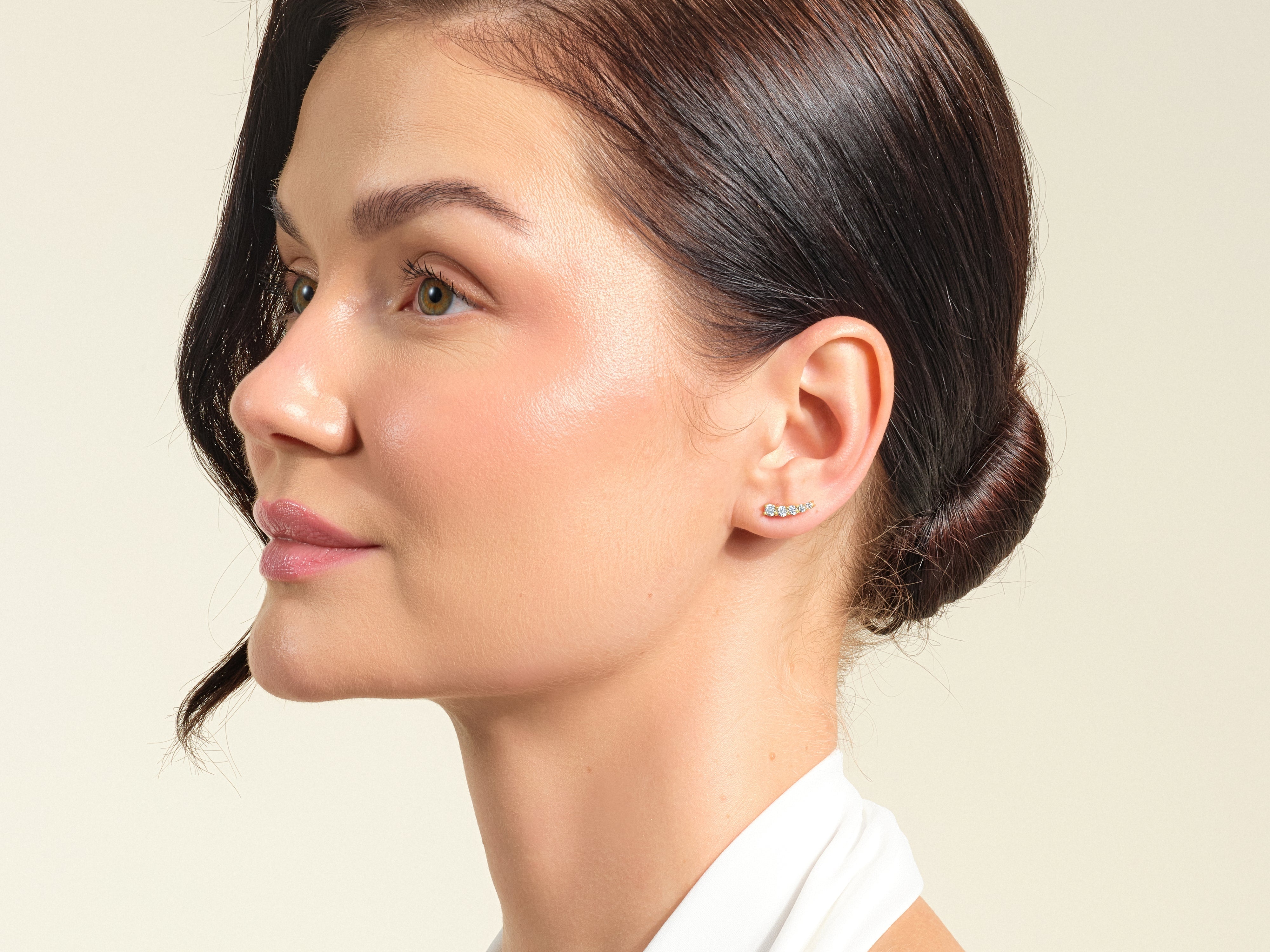 Diamond cluster ear climber jewelry on model