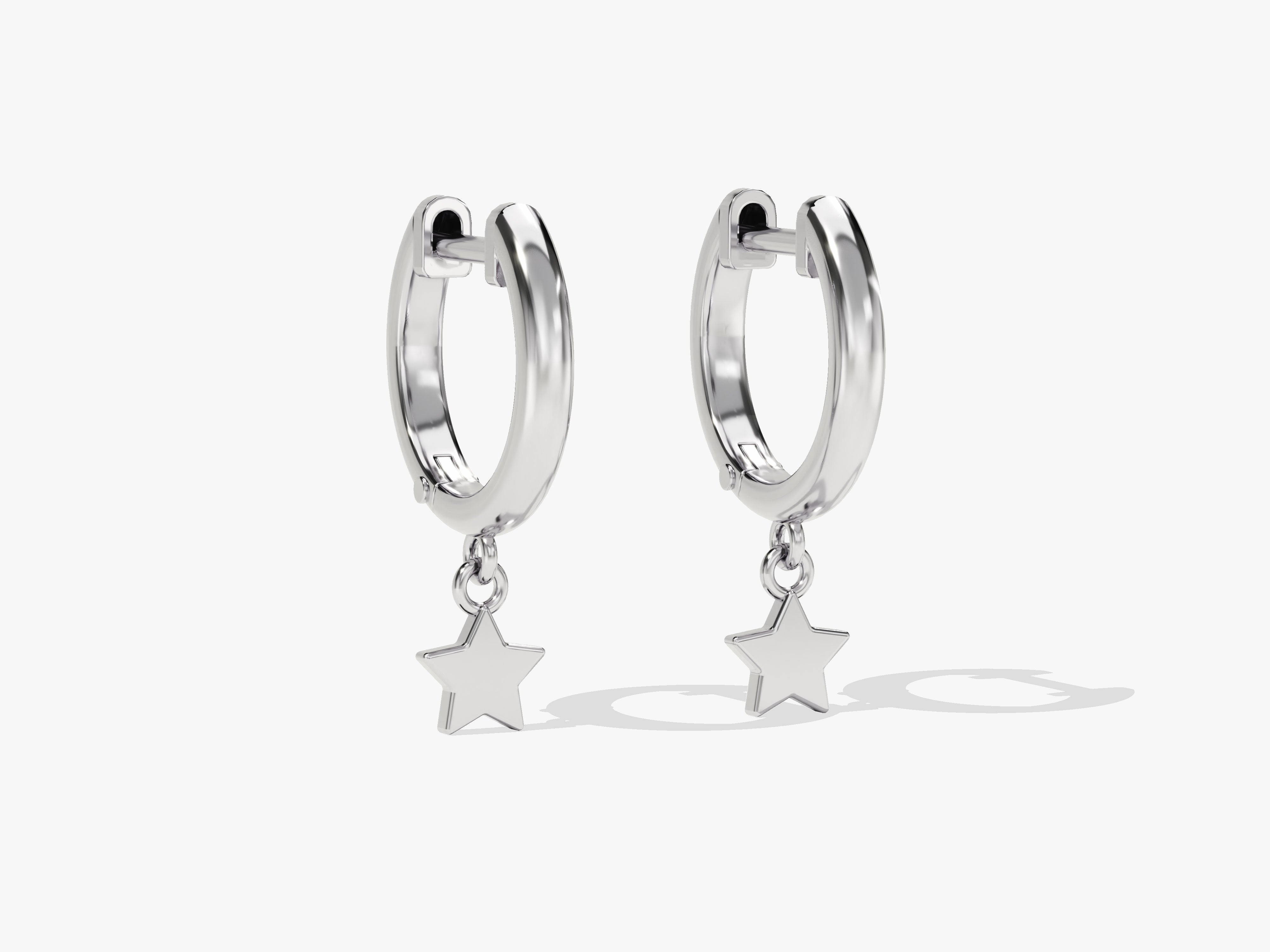 Silver hoop earrings with dangling star charms from jewelry collection