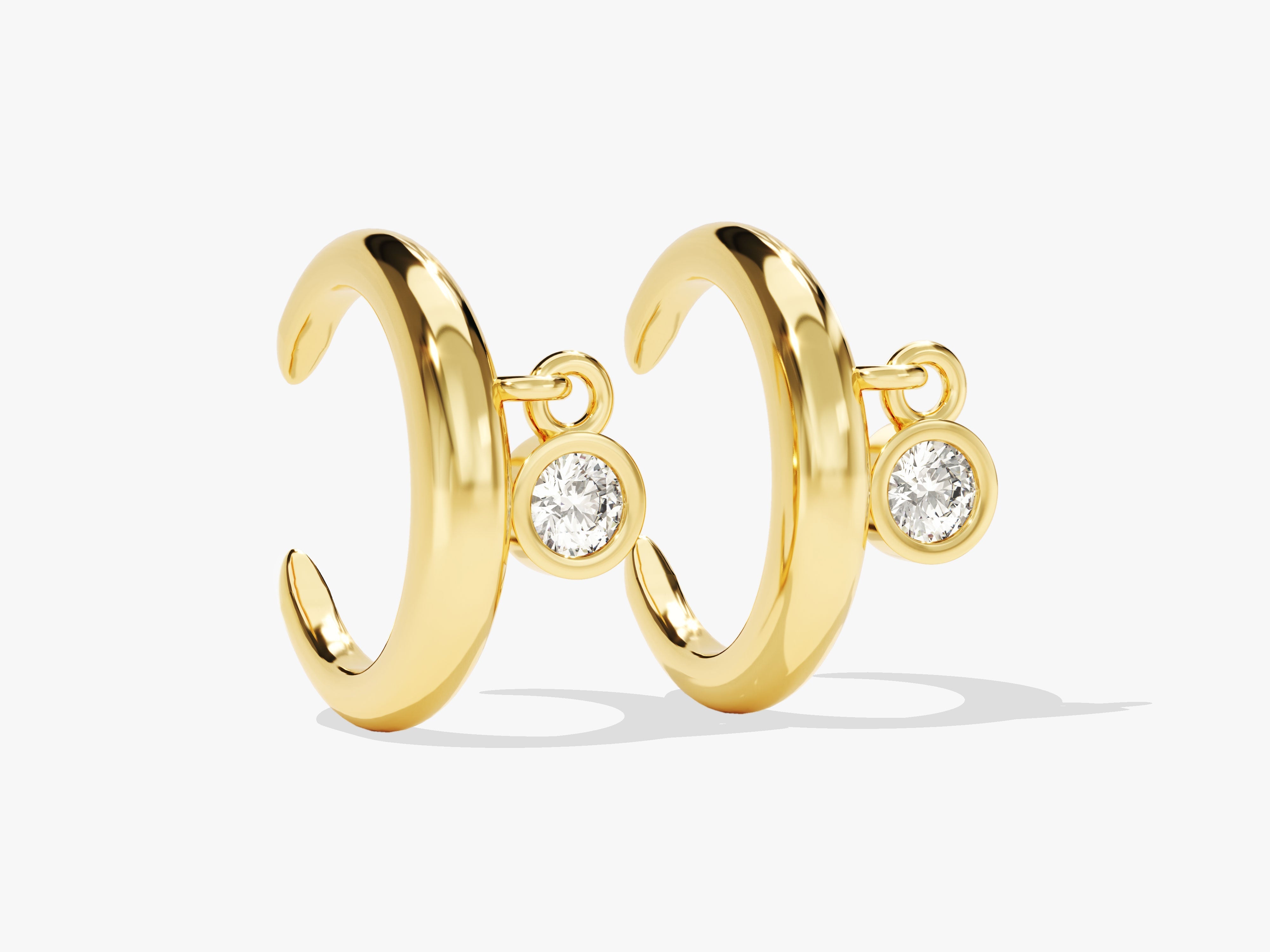 Gold hoop earrings with diamond accents from jewelry firm