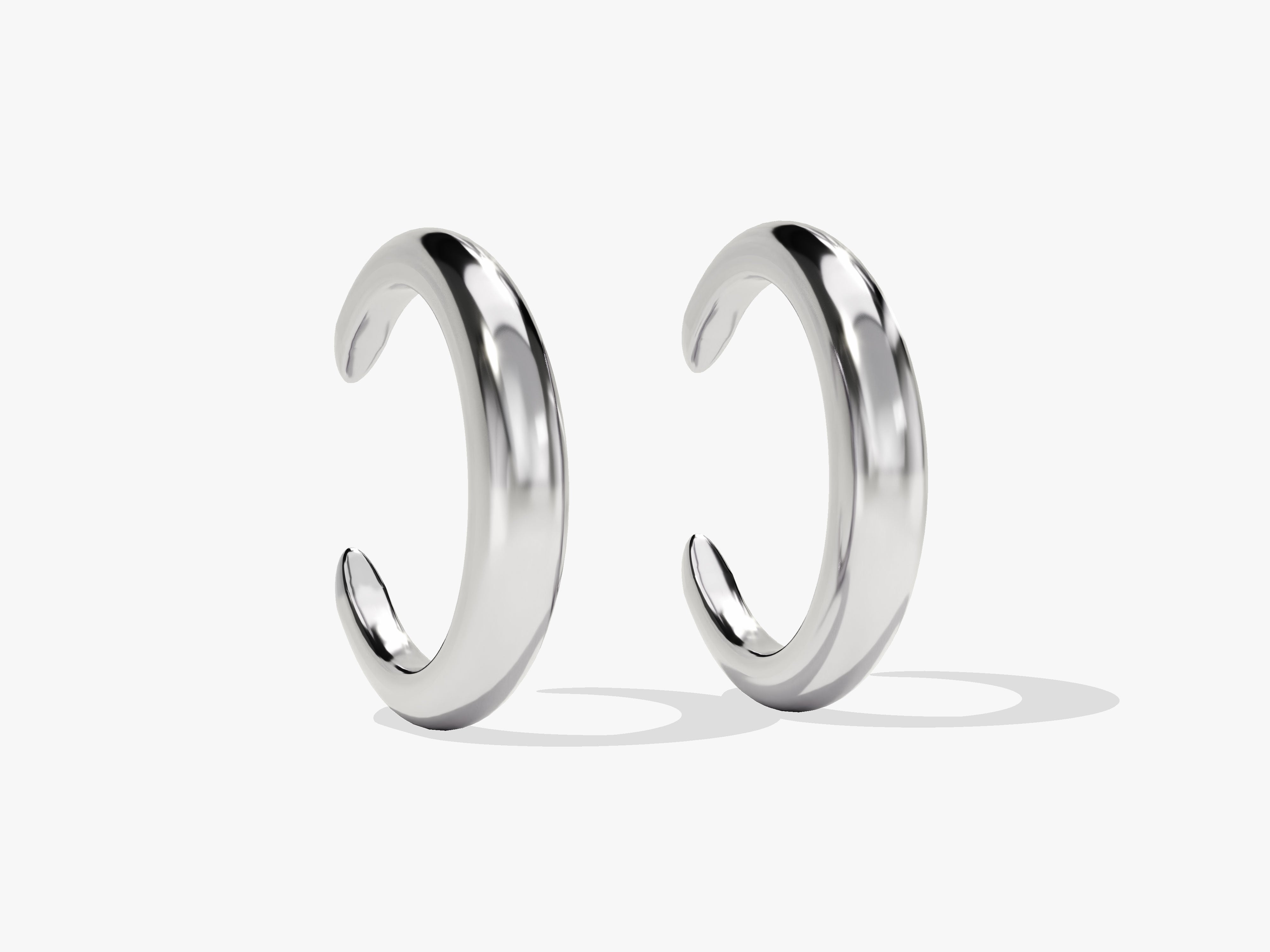 Sleek silver hoop earrings from a jewelry brand