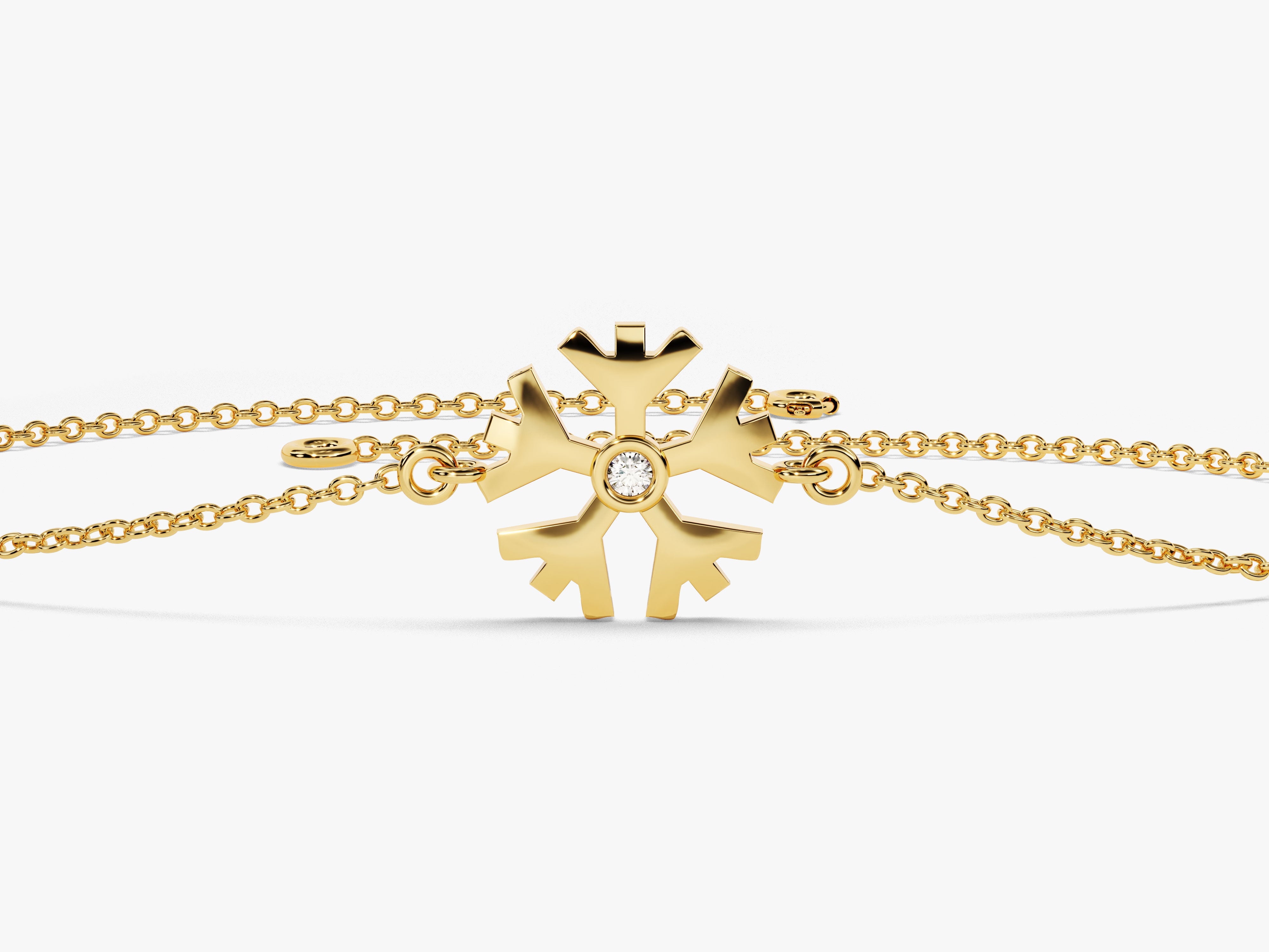 Gold snowflake bracelet with diamond accent jewelry