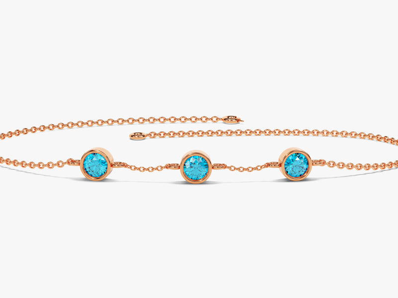 Bezel Set Blue Topaz Station Bracelet in 14k Solid Gold