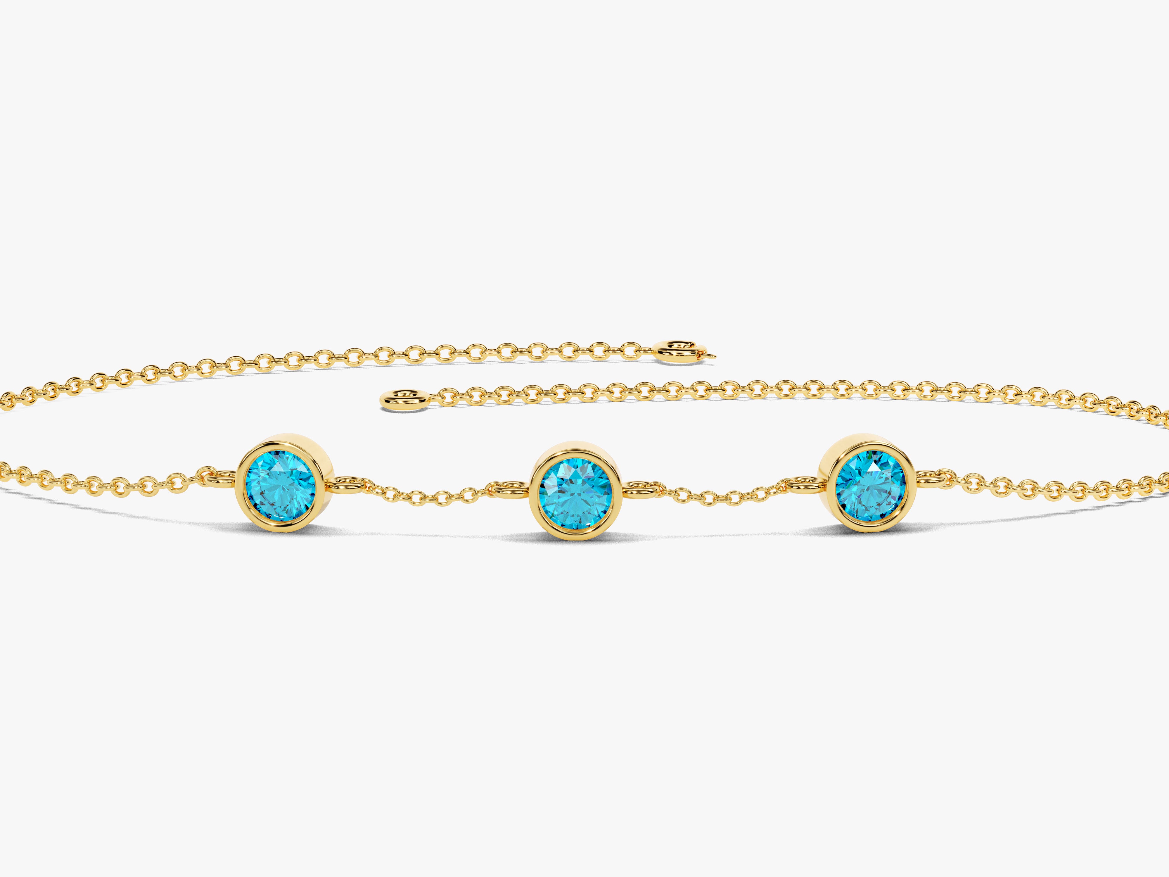 Bezel Set Blue Topaz Station Bracelet in 14k Solid Gold