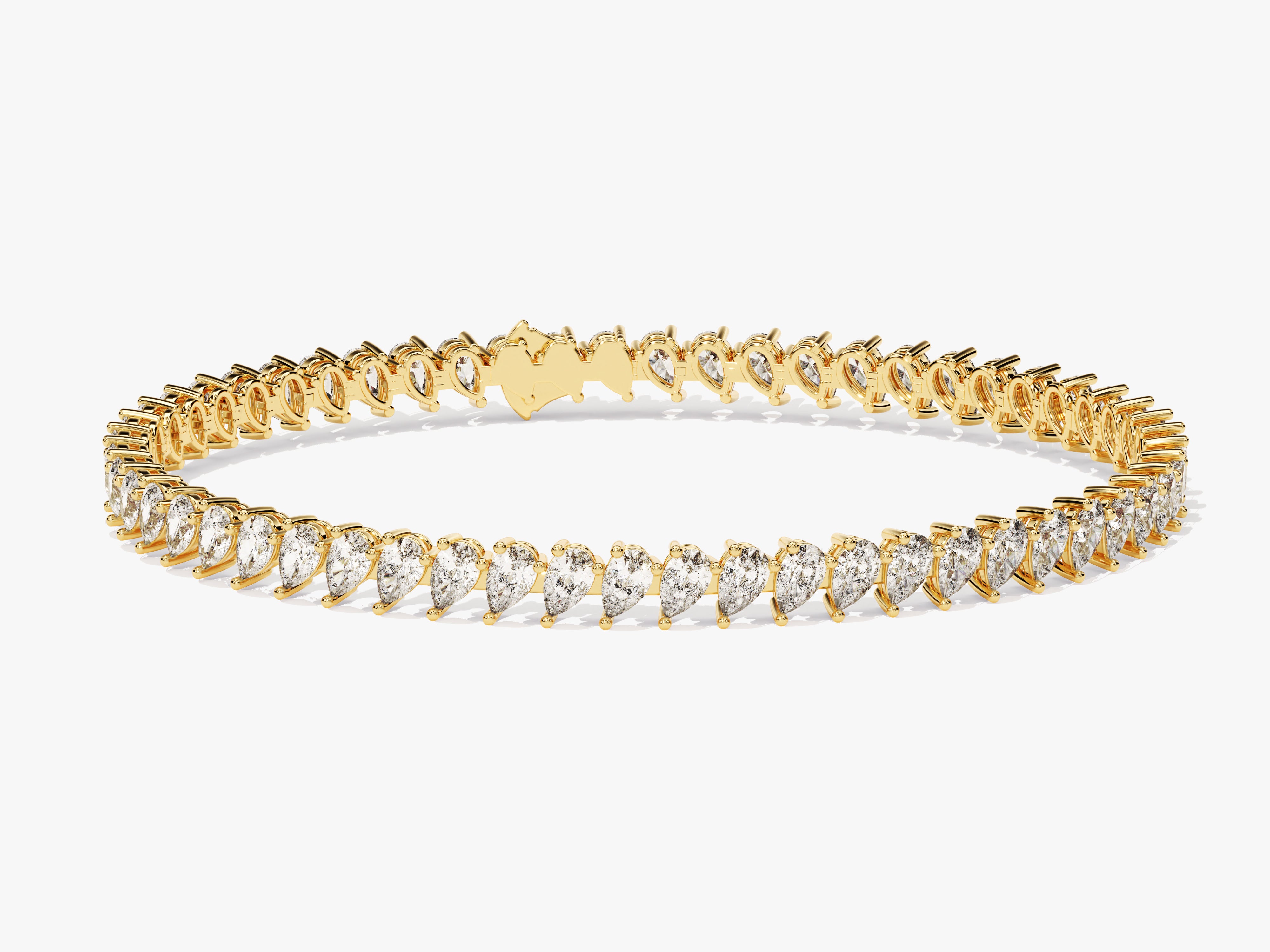 Gold tennis bracelet with pear-shaped diamonds