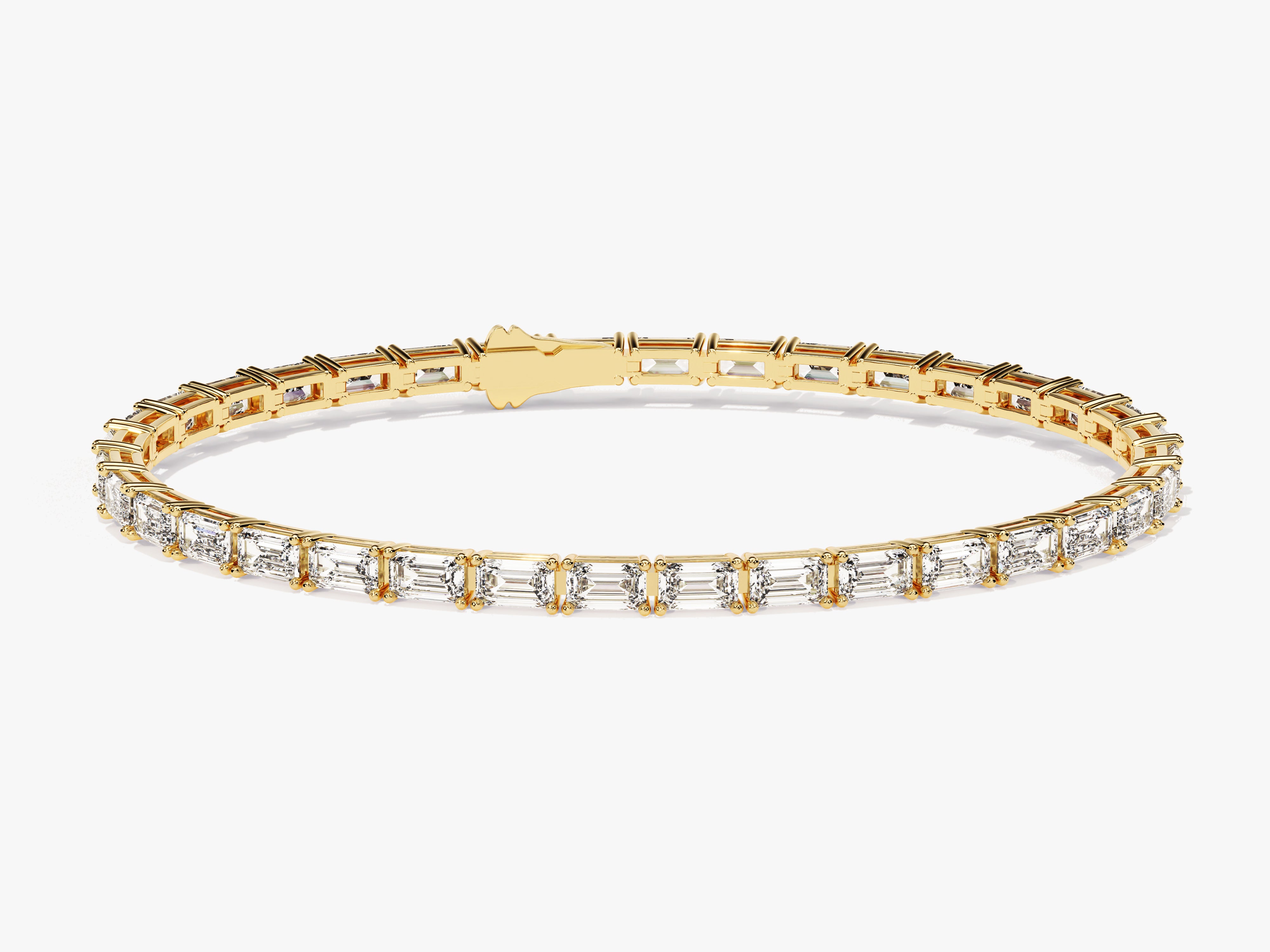 Emerald cut diamond tennis bracelet in yellow gold