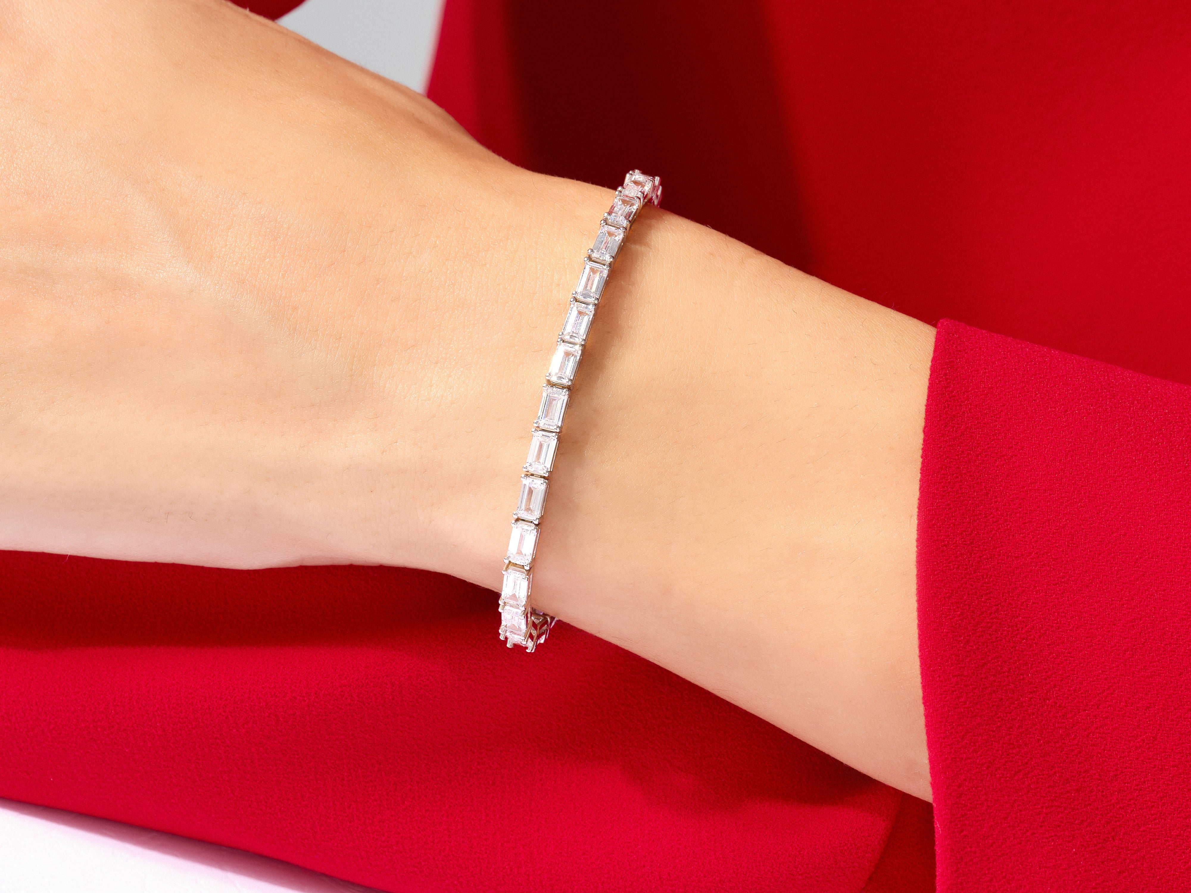 Diamond tennis bracelet on a woman's wrist, luxury jewelry