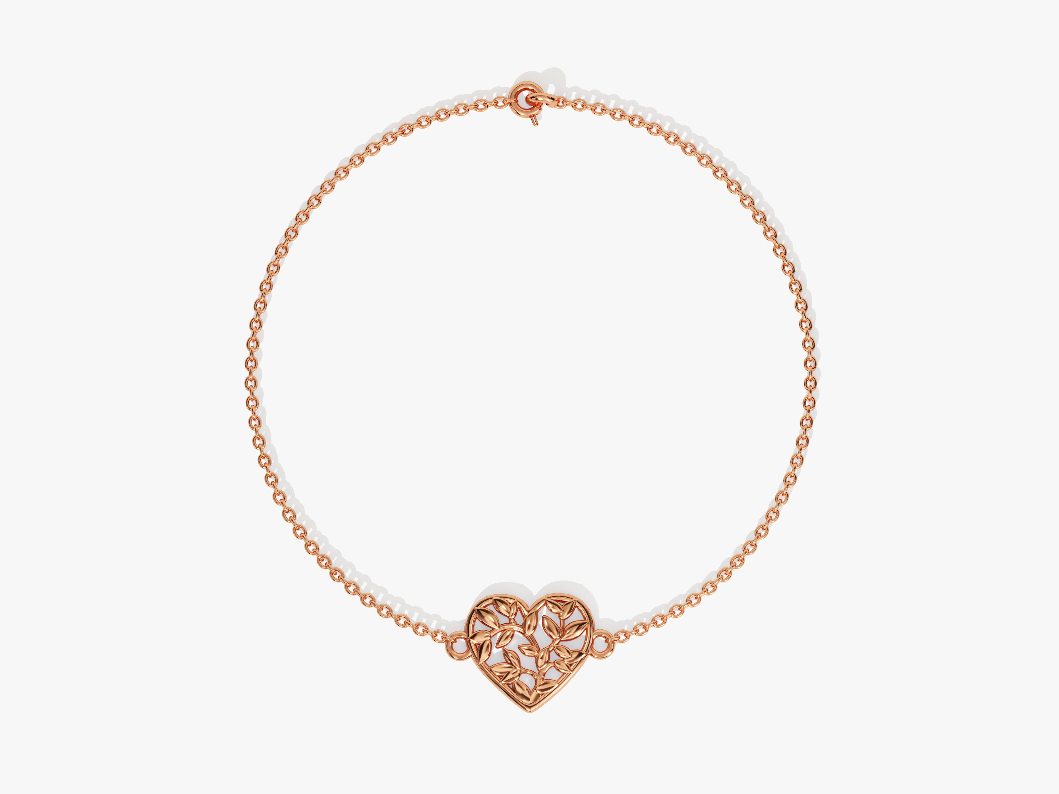 Rose gold bracelet with intricate leaf heart charm