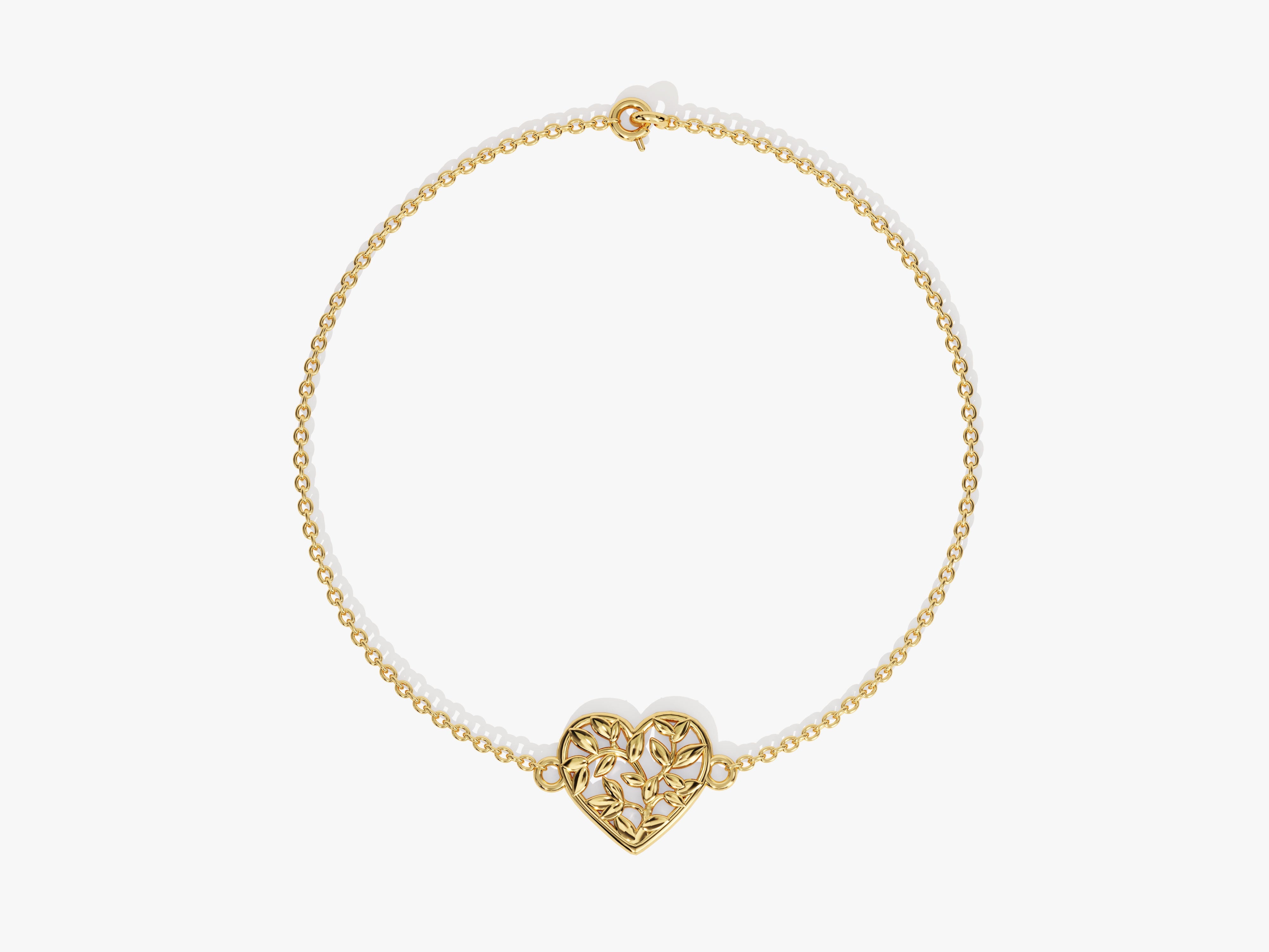 Gold heart bracelet with intricate leaf design, fine jewelry
