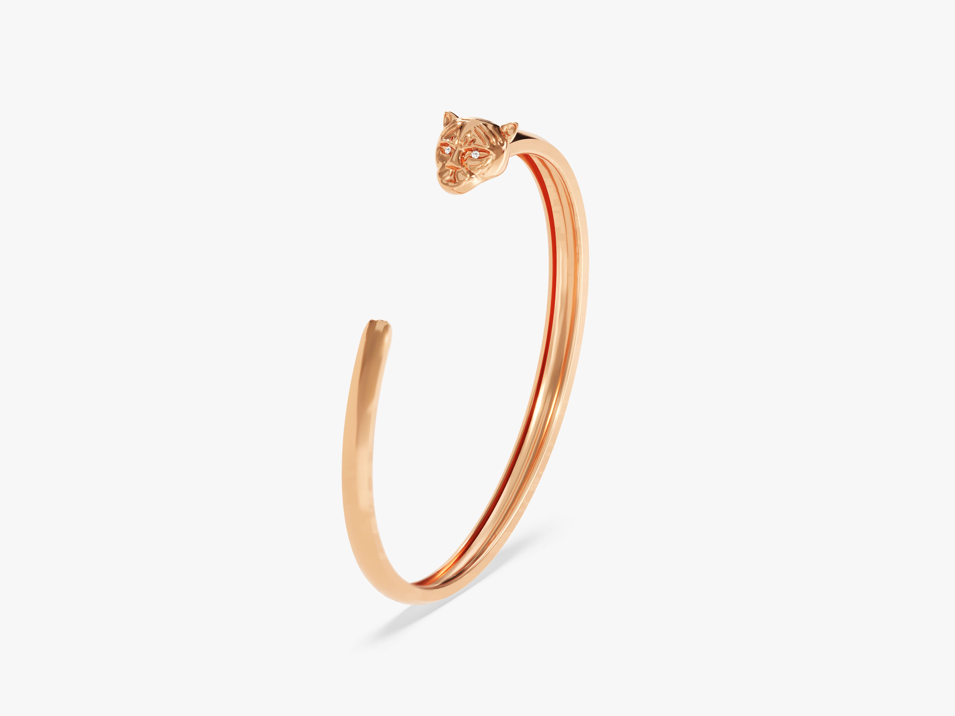 Rose gold panther head bangle bracelet with diamond eyes