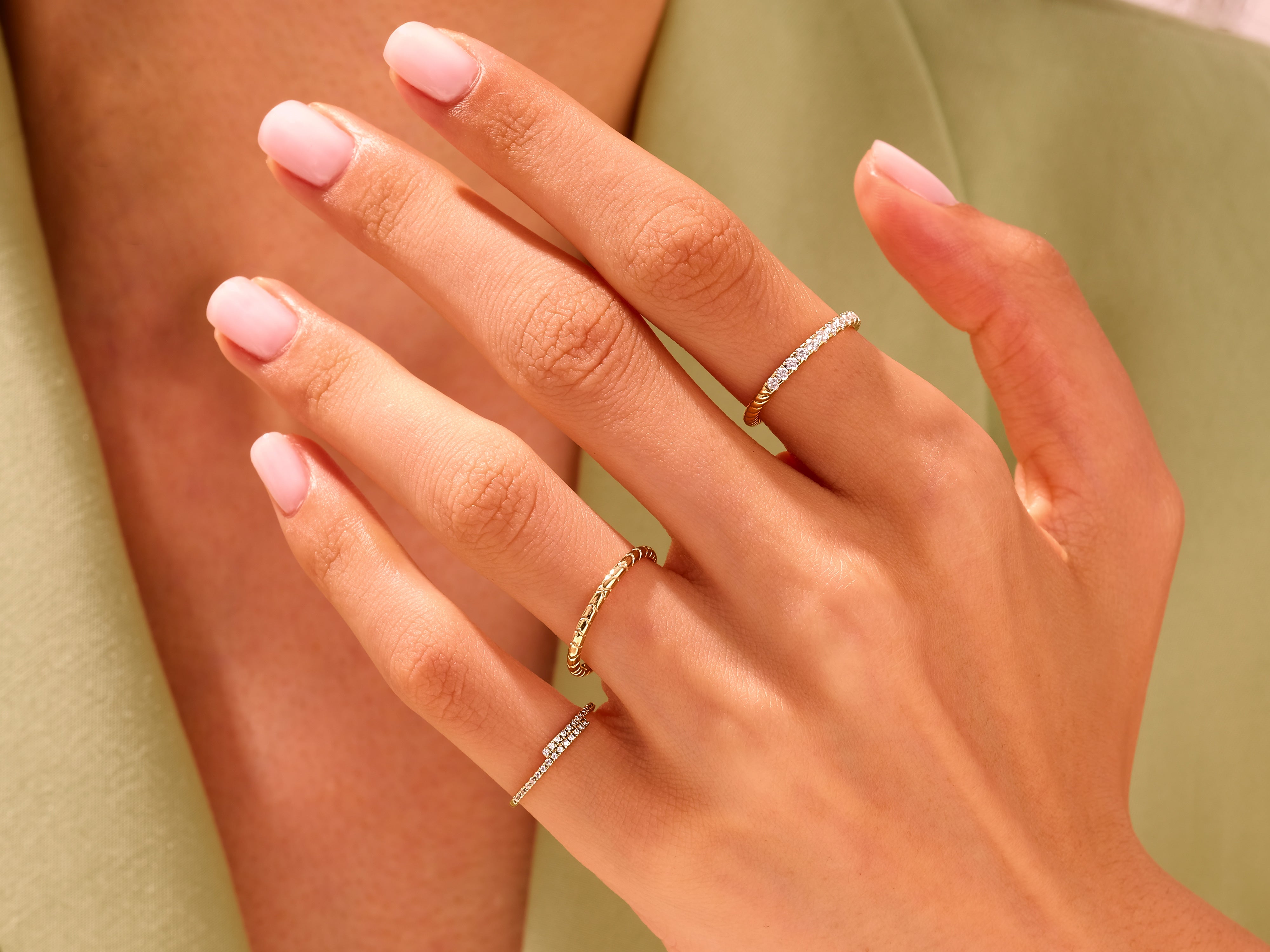 Diamond and gold rings on hand, jewelry for women