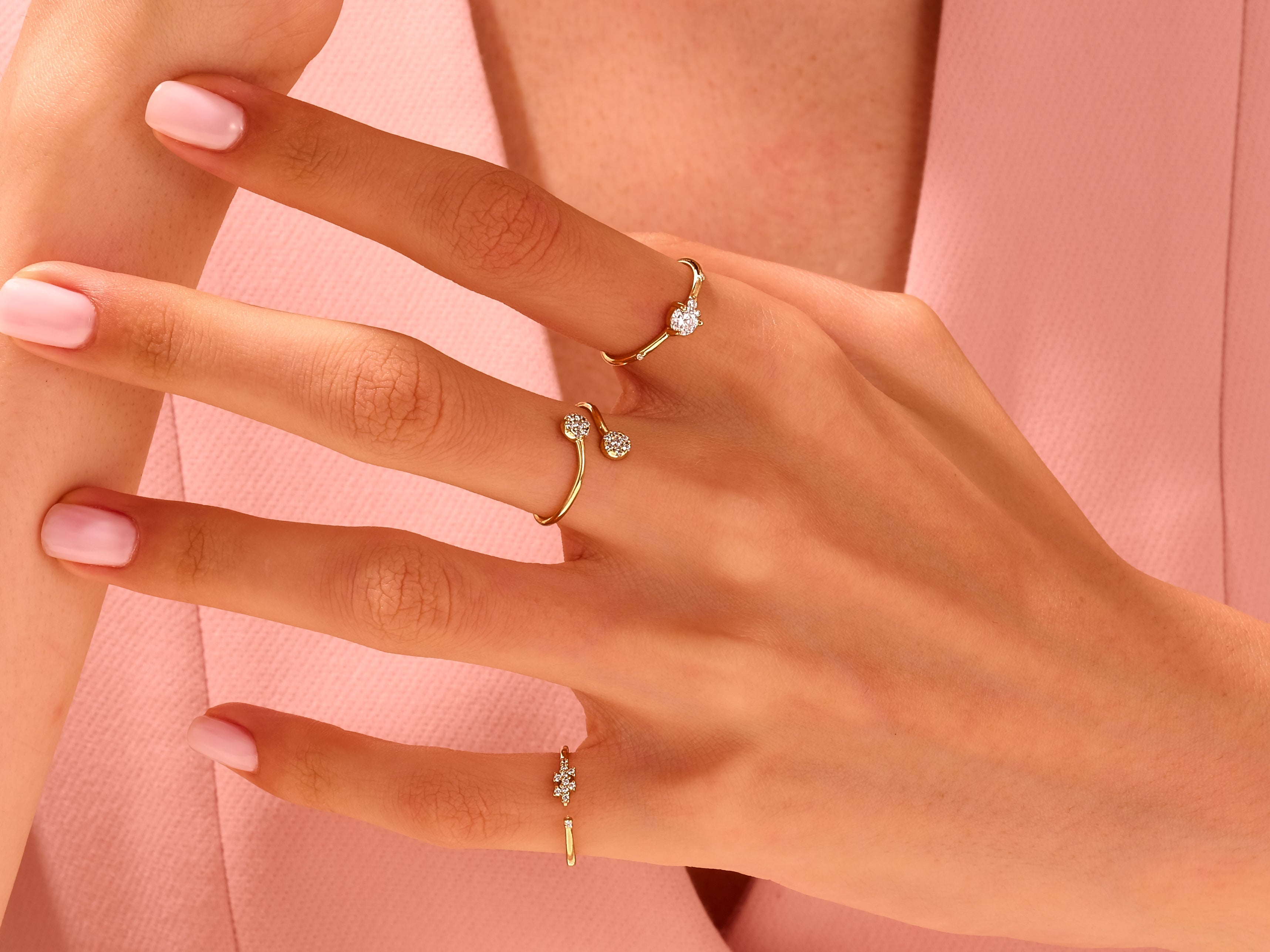 Gold diamond rings on a hand, jewelry for women