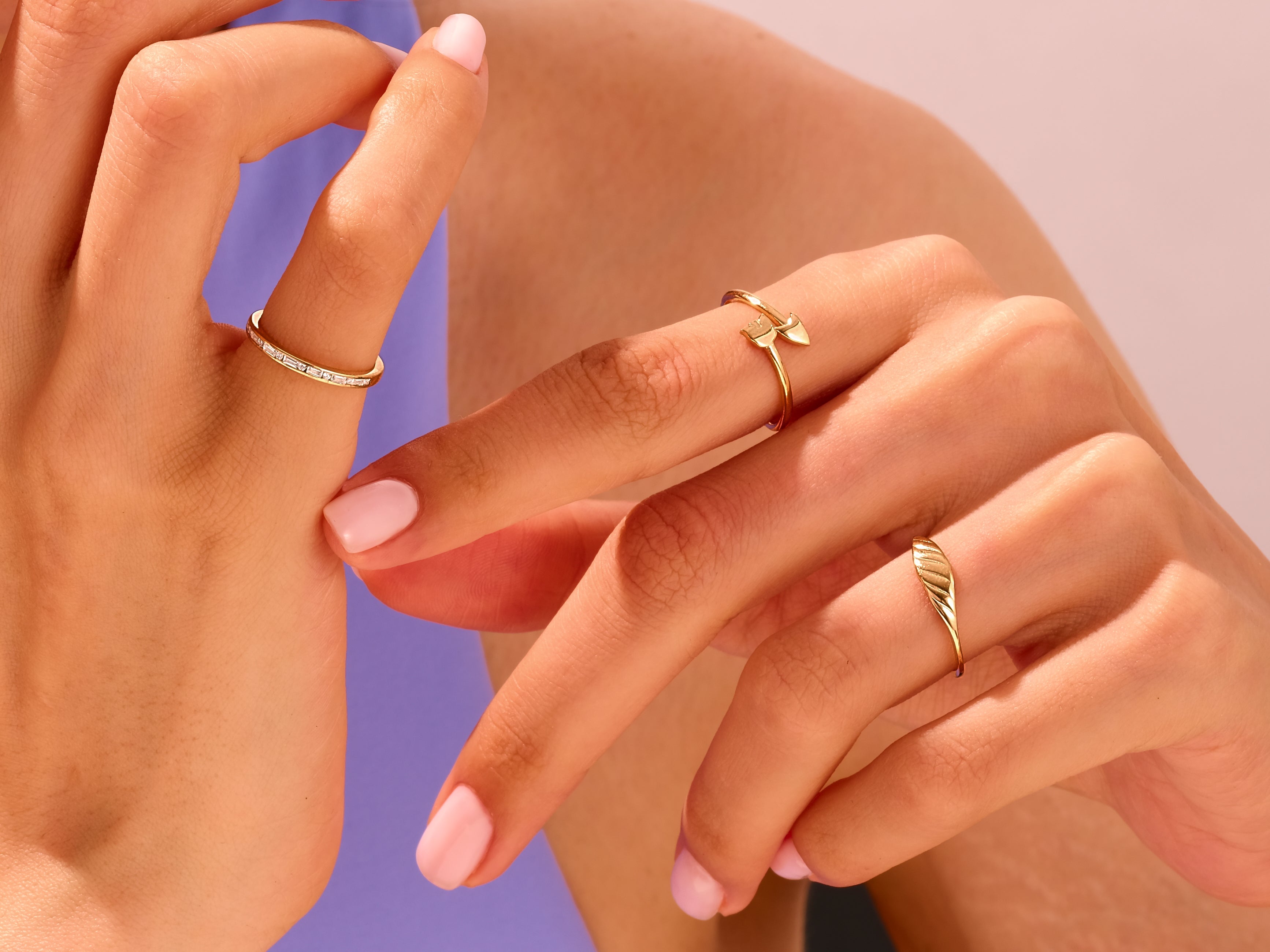 Gold rings on fingers, delicate jewelry for women