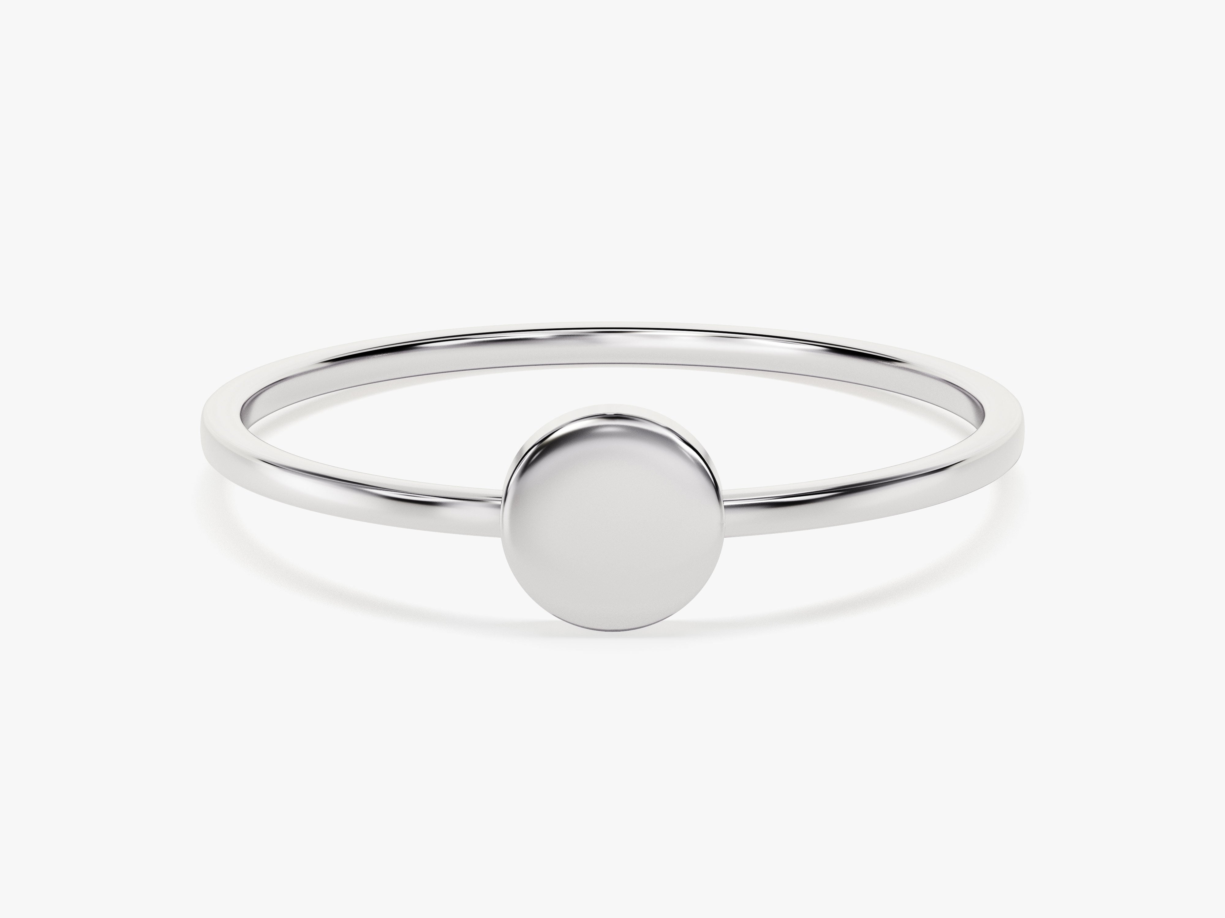 Minimalist silver ring with a smooth oval face, jewelry