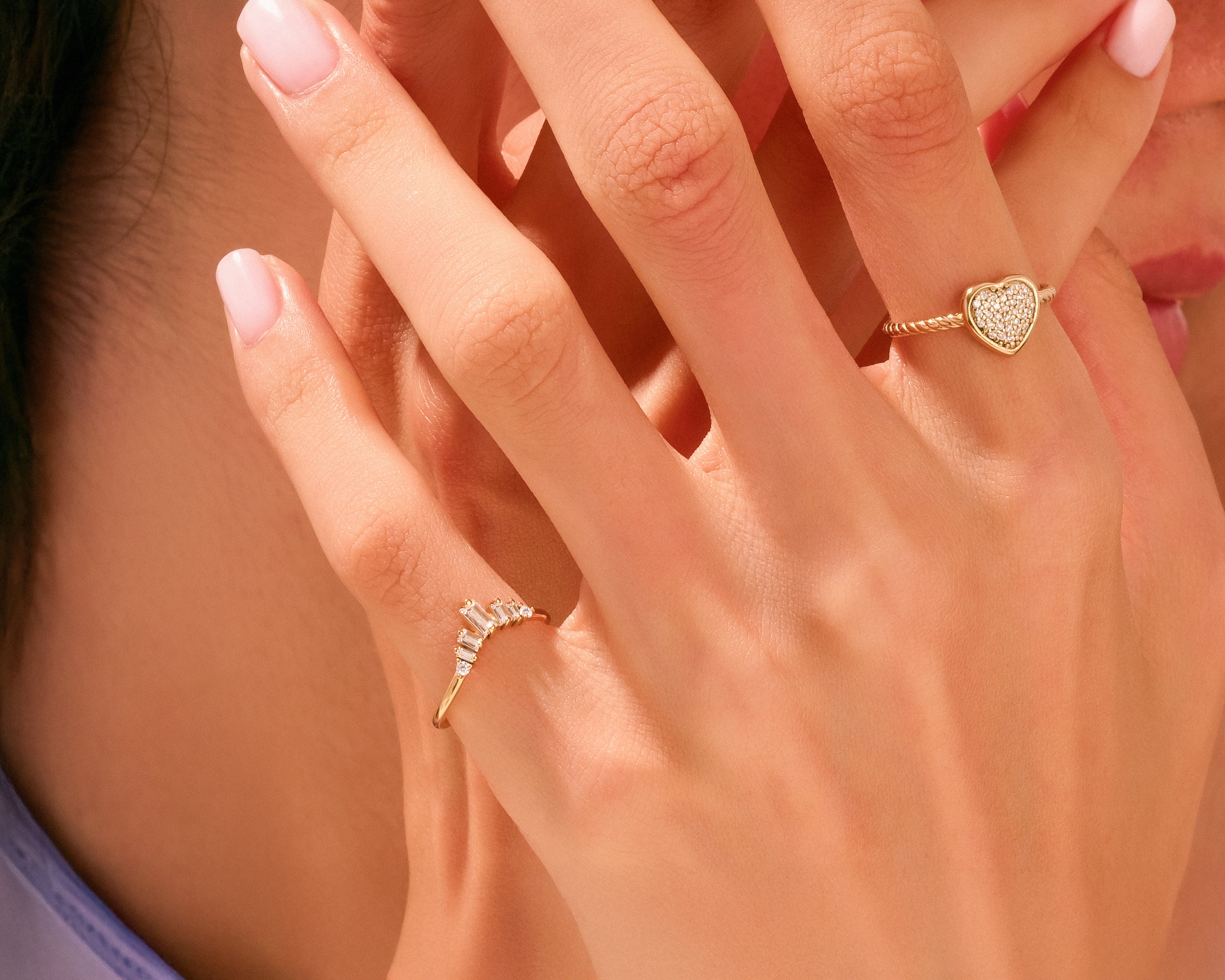 Gold rings with diamonds, heart and chevron designs