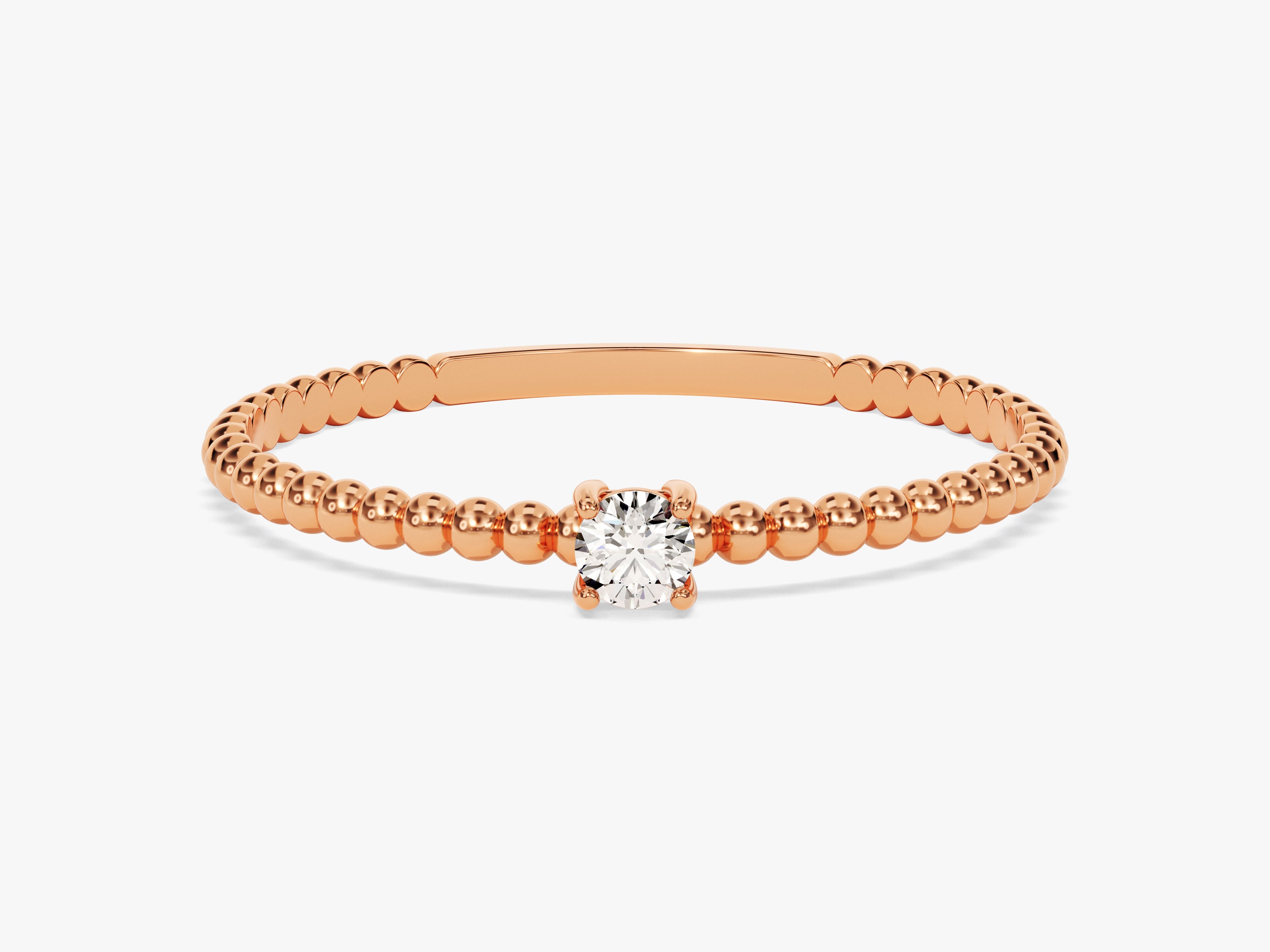 Rose gold beaded ring with diamond solitaire jewelry