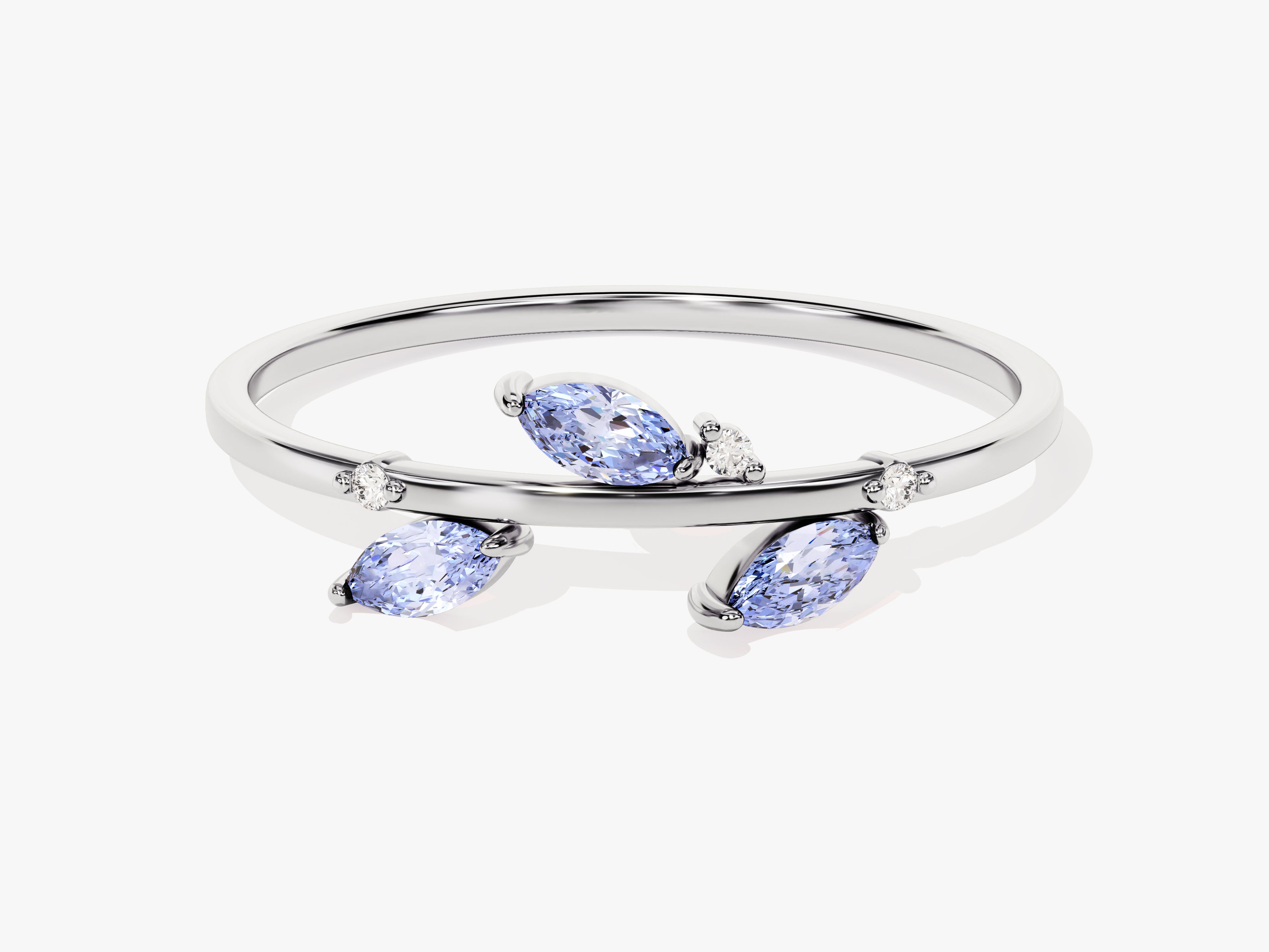 Silver ring with marquise blue stones and diamonds