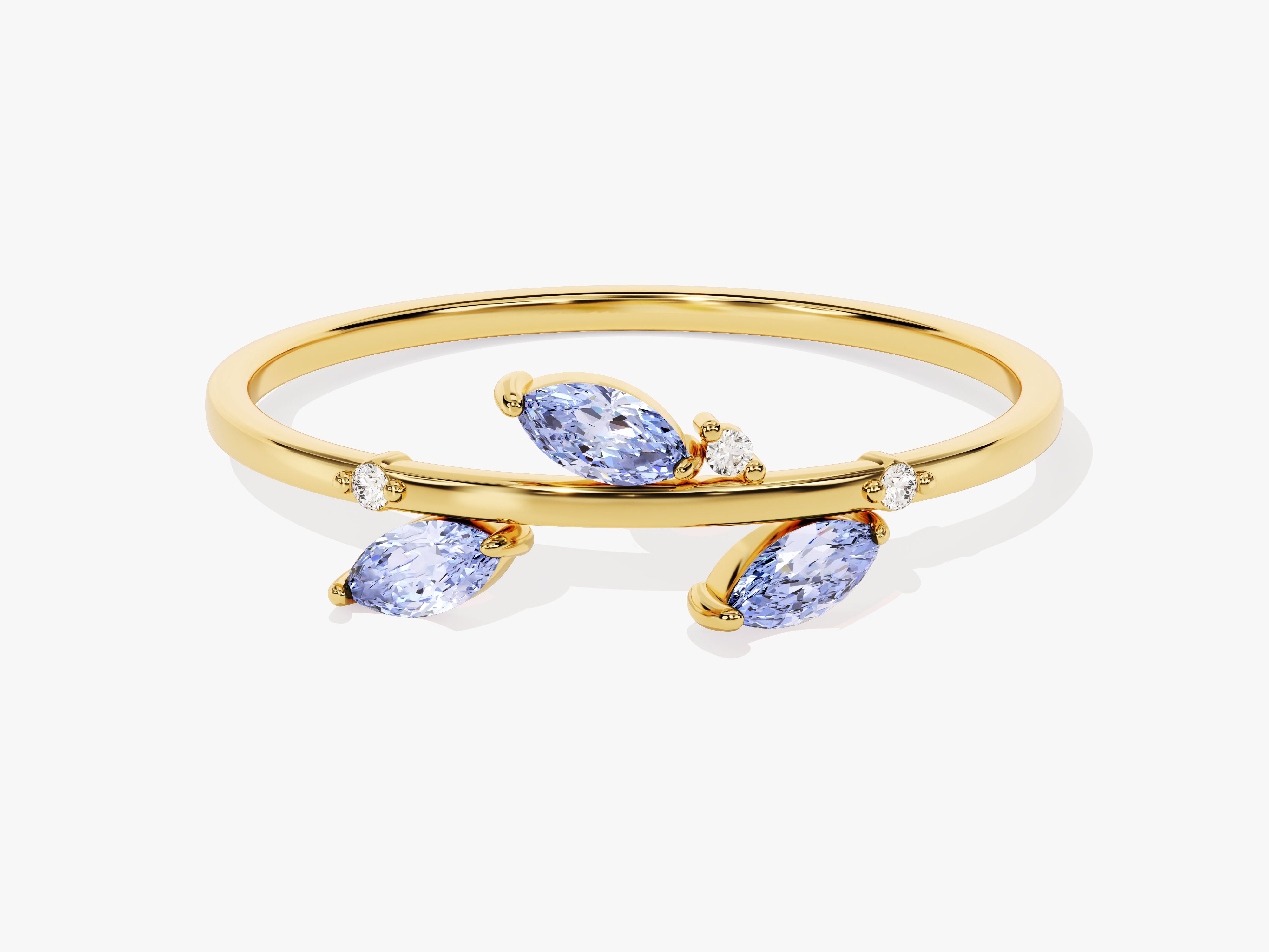 Gold ring with marquise blue gems and diamonds