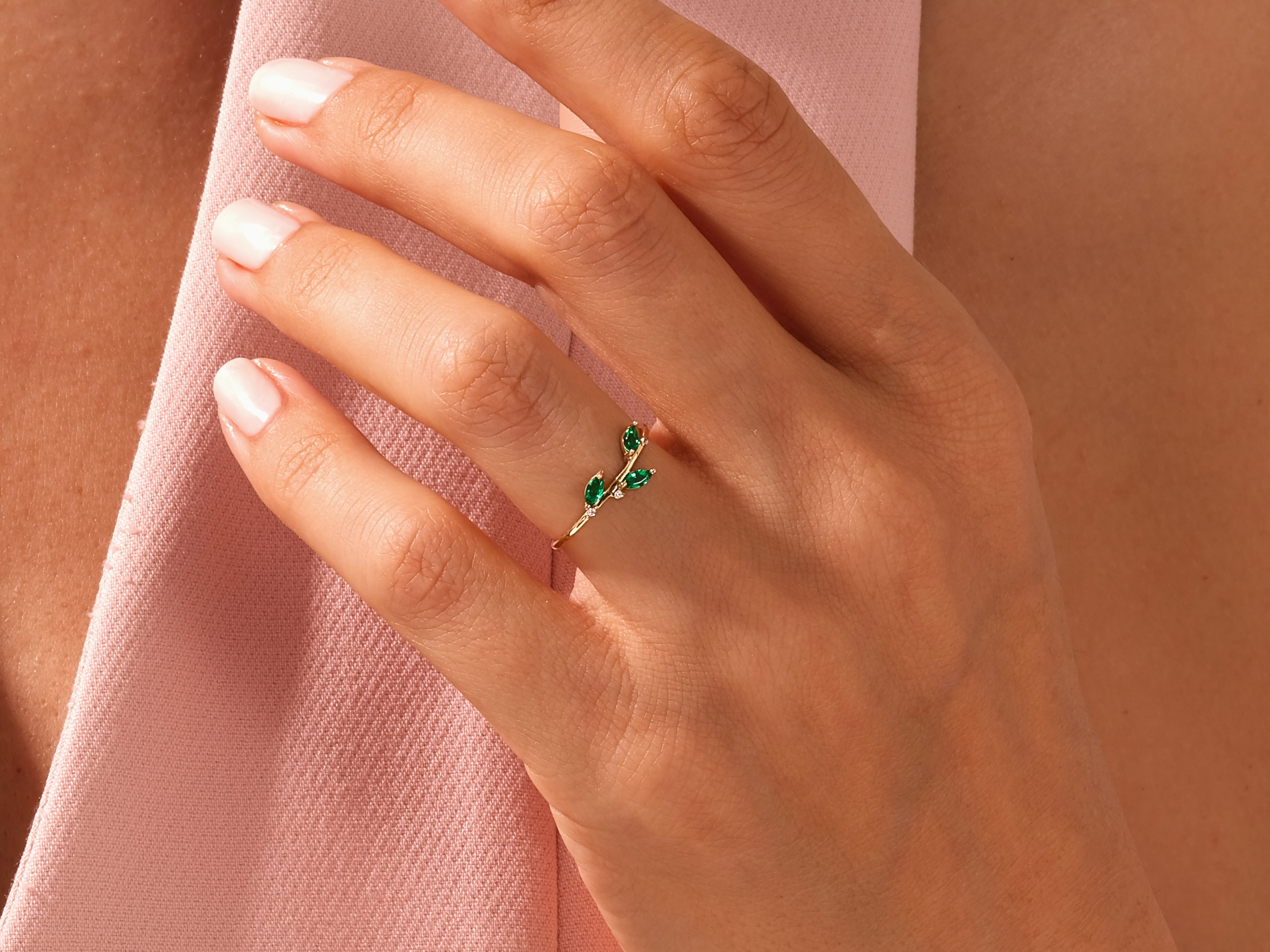 Gold leaf ring with emeralds, elegant jewelry for women