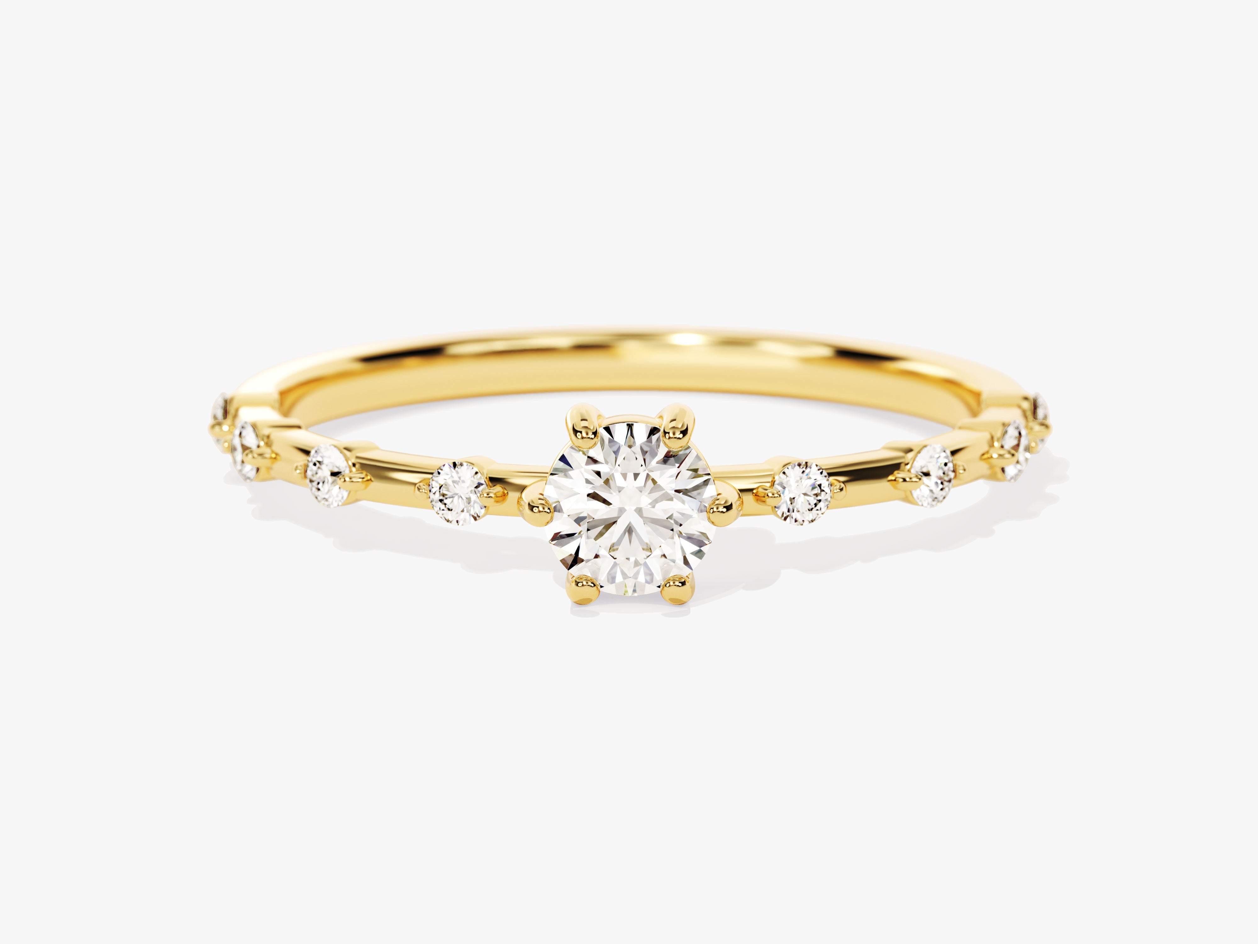Gold diamond ring with central stone and side accents