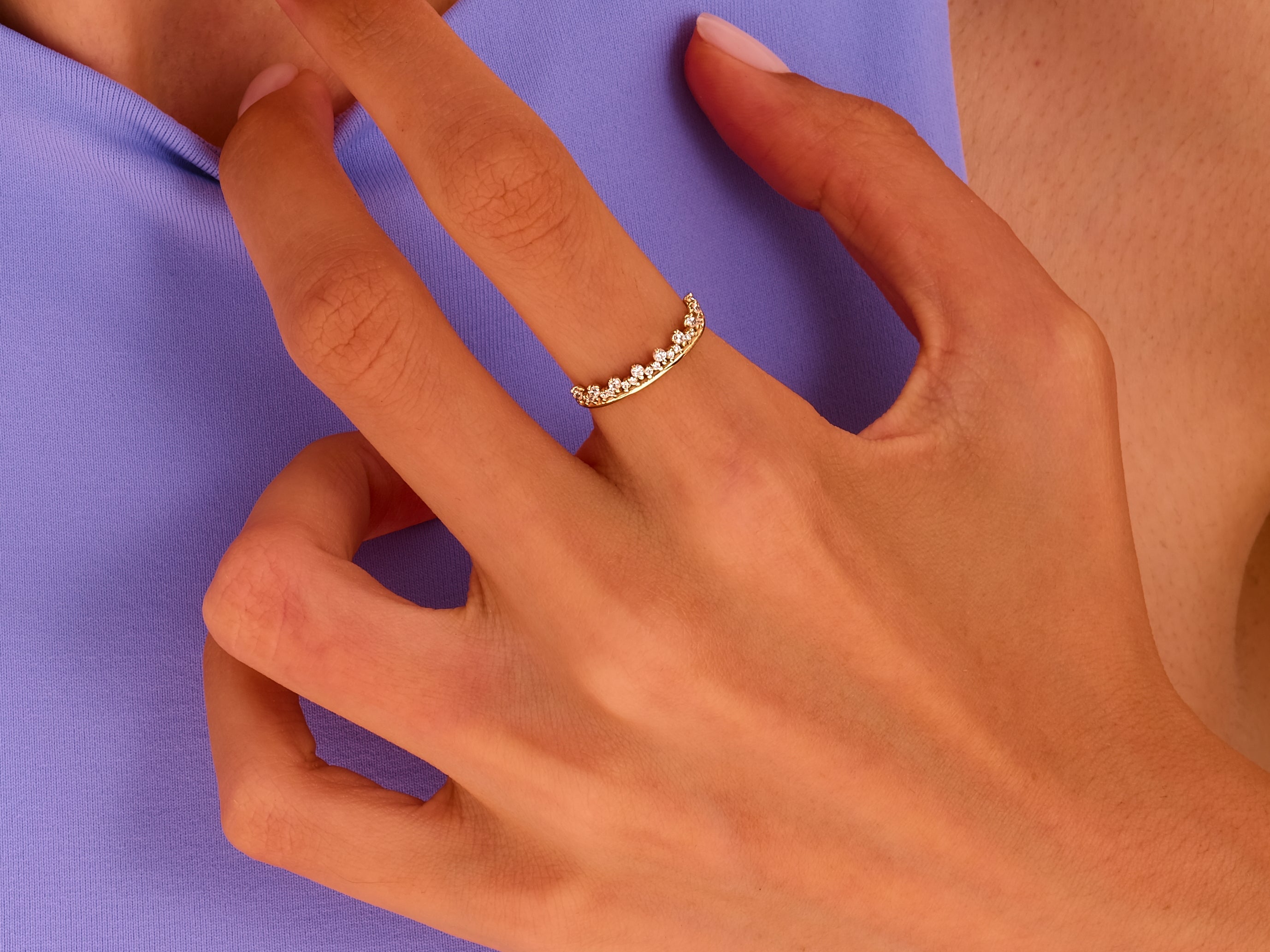 Diamond crown ring on a hand, jewelry product photography
