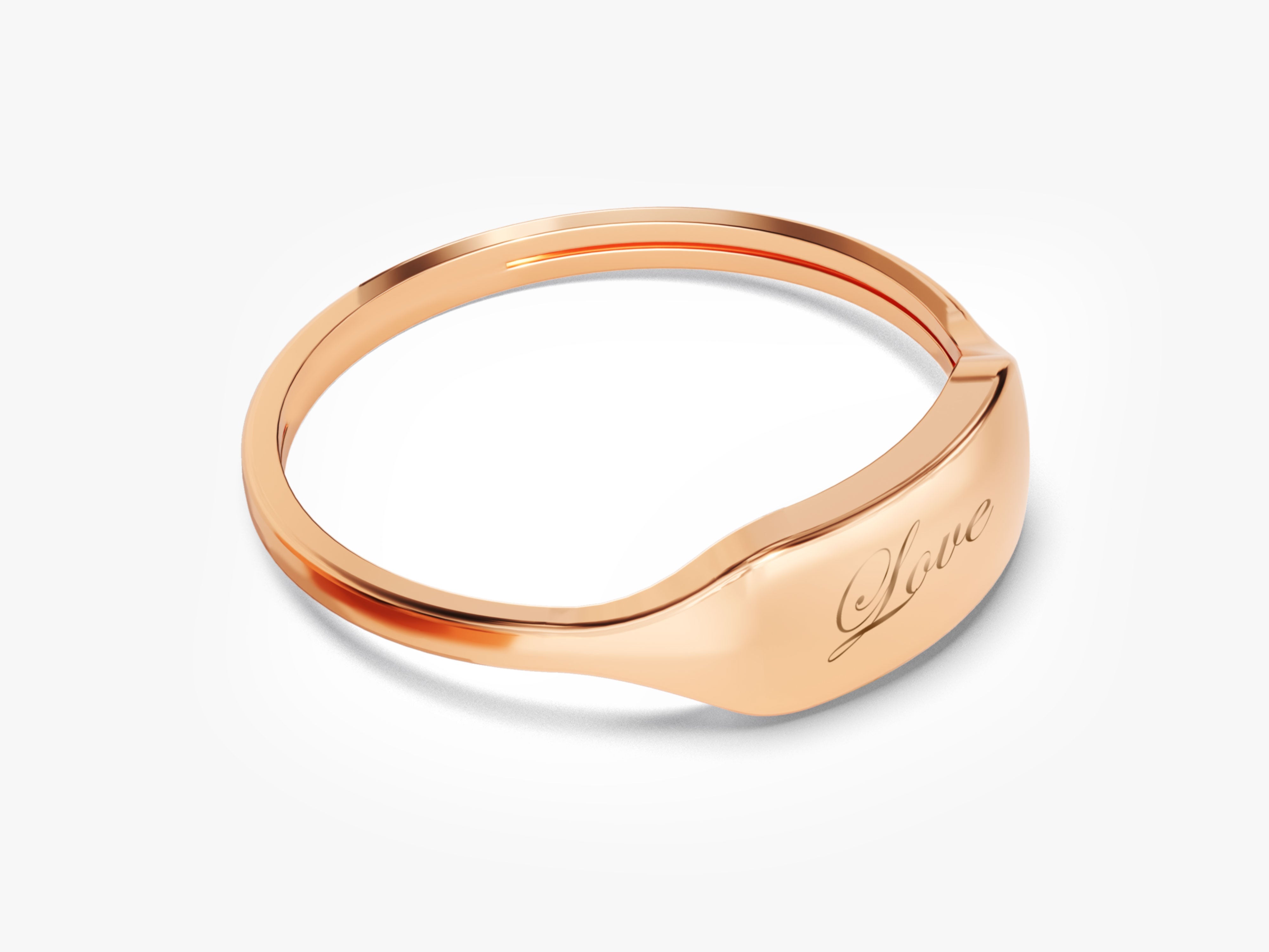 Rose gold signet ring with engraved "Love" inscription