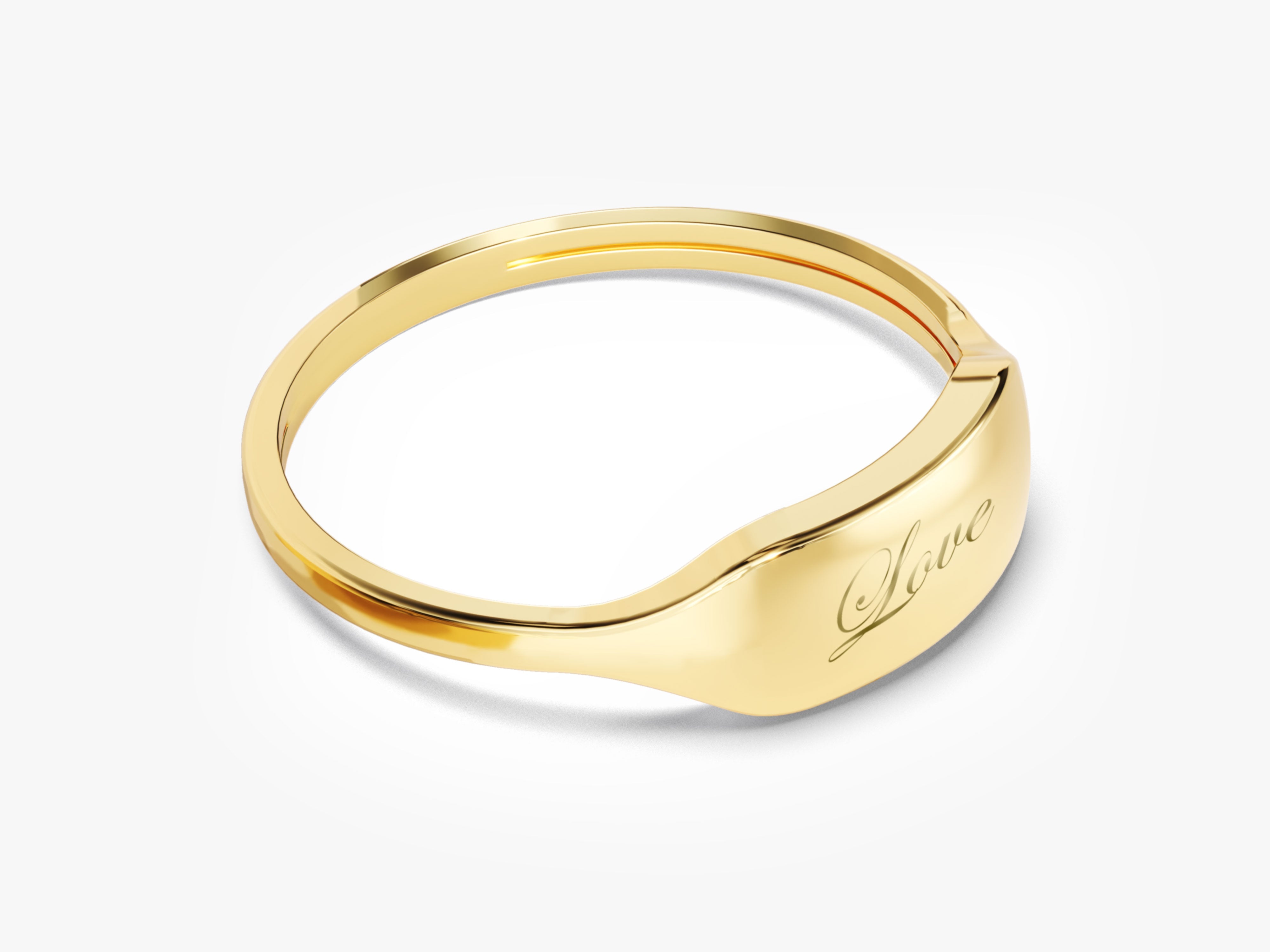 Gold signet ring with engraved "Love" inscription