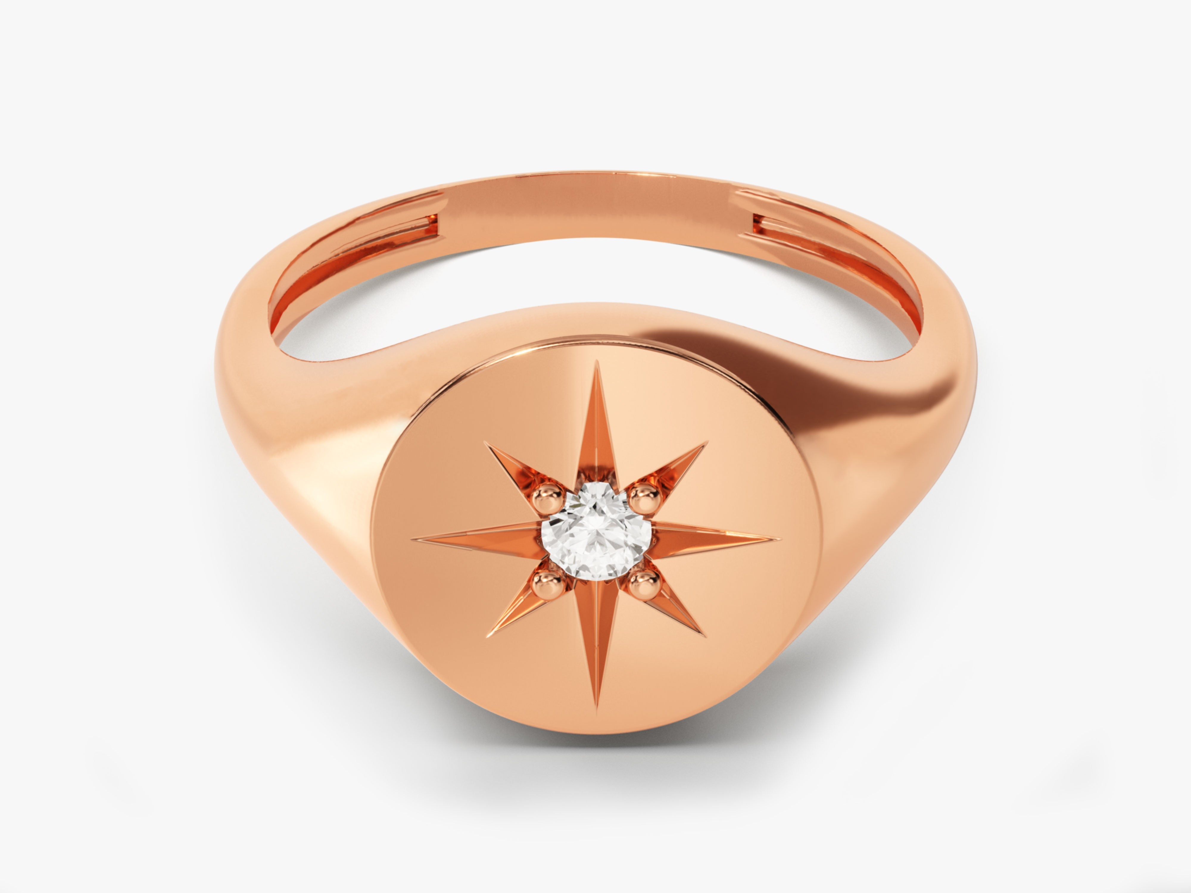 Rose gold signet ring with diamond starburst design