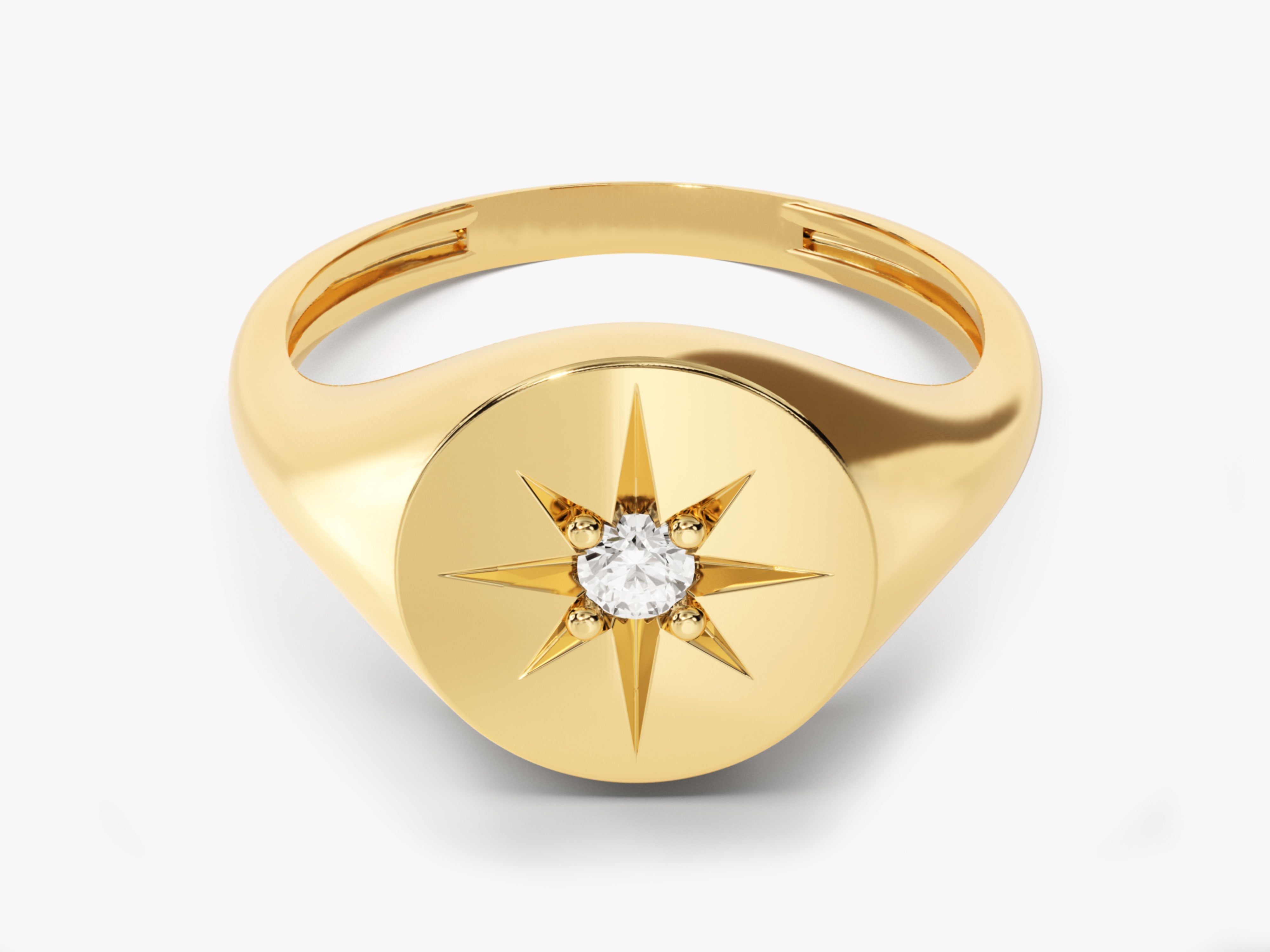 Gold signet ring with diamond starburst design