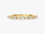Gold band ring with alternating round and baguette diamonds