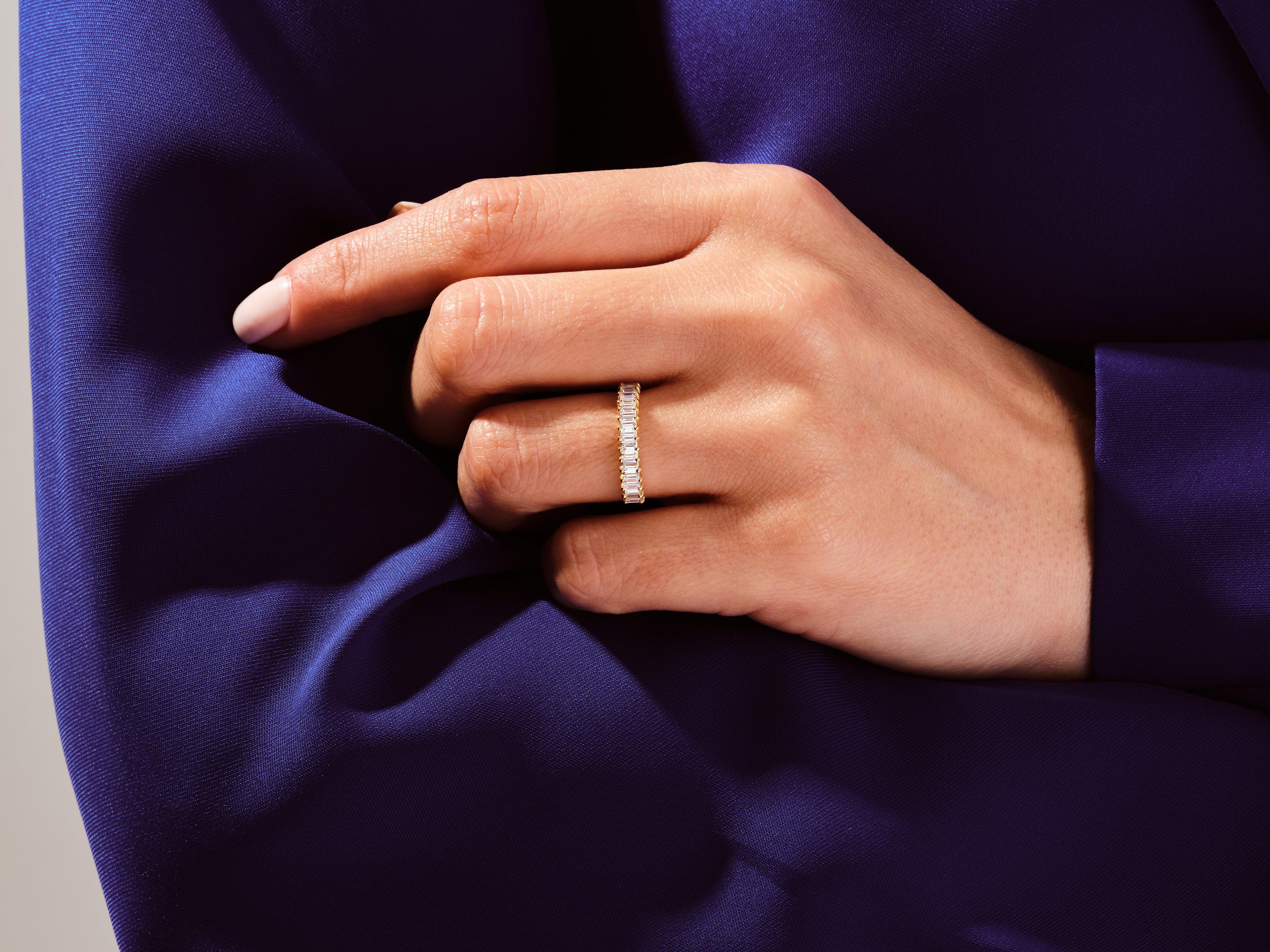 Diamond baguette ring on hand, luxury jewelry