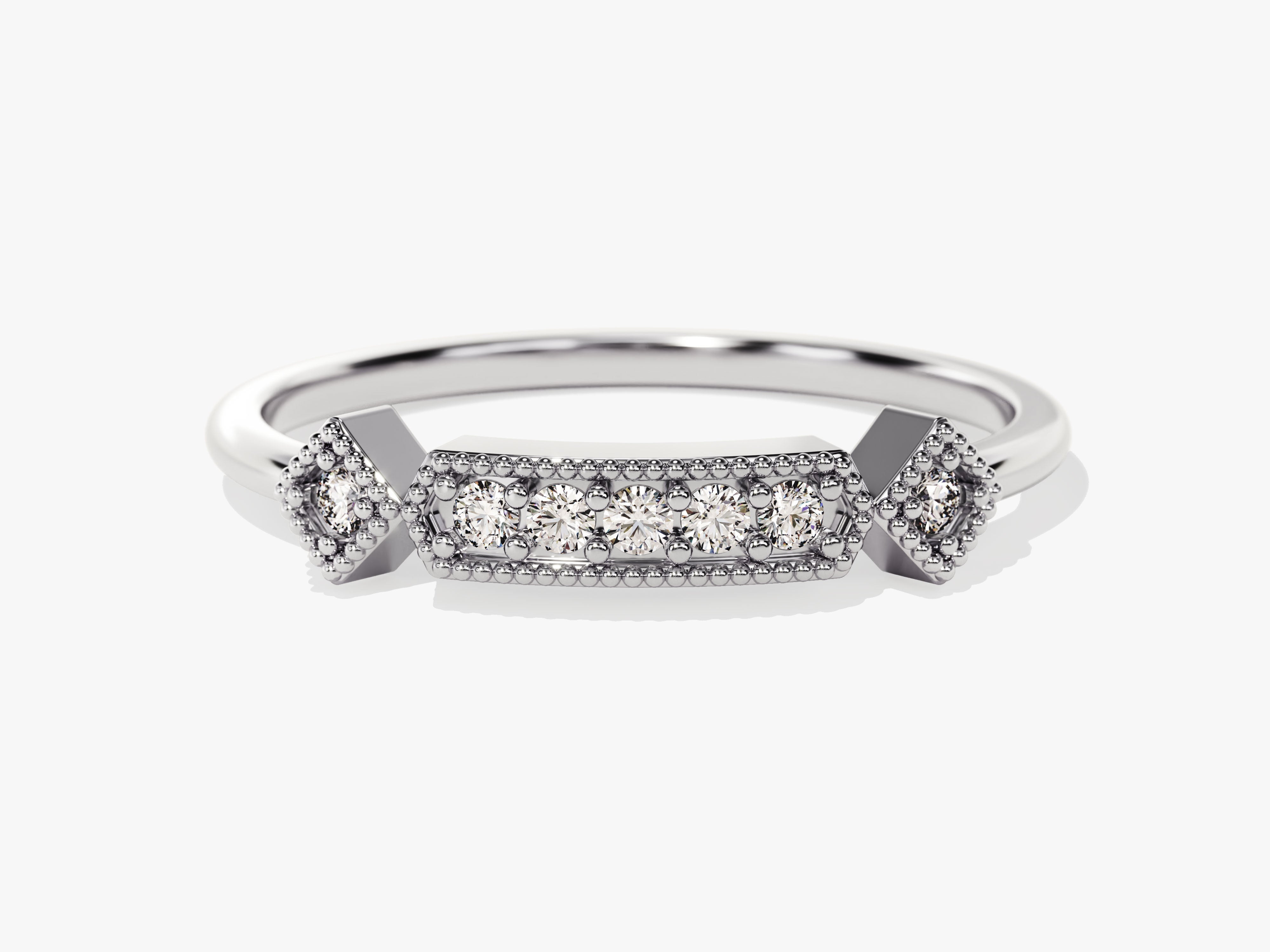 Diamond engagement ring with beaded accents and geometric design