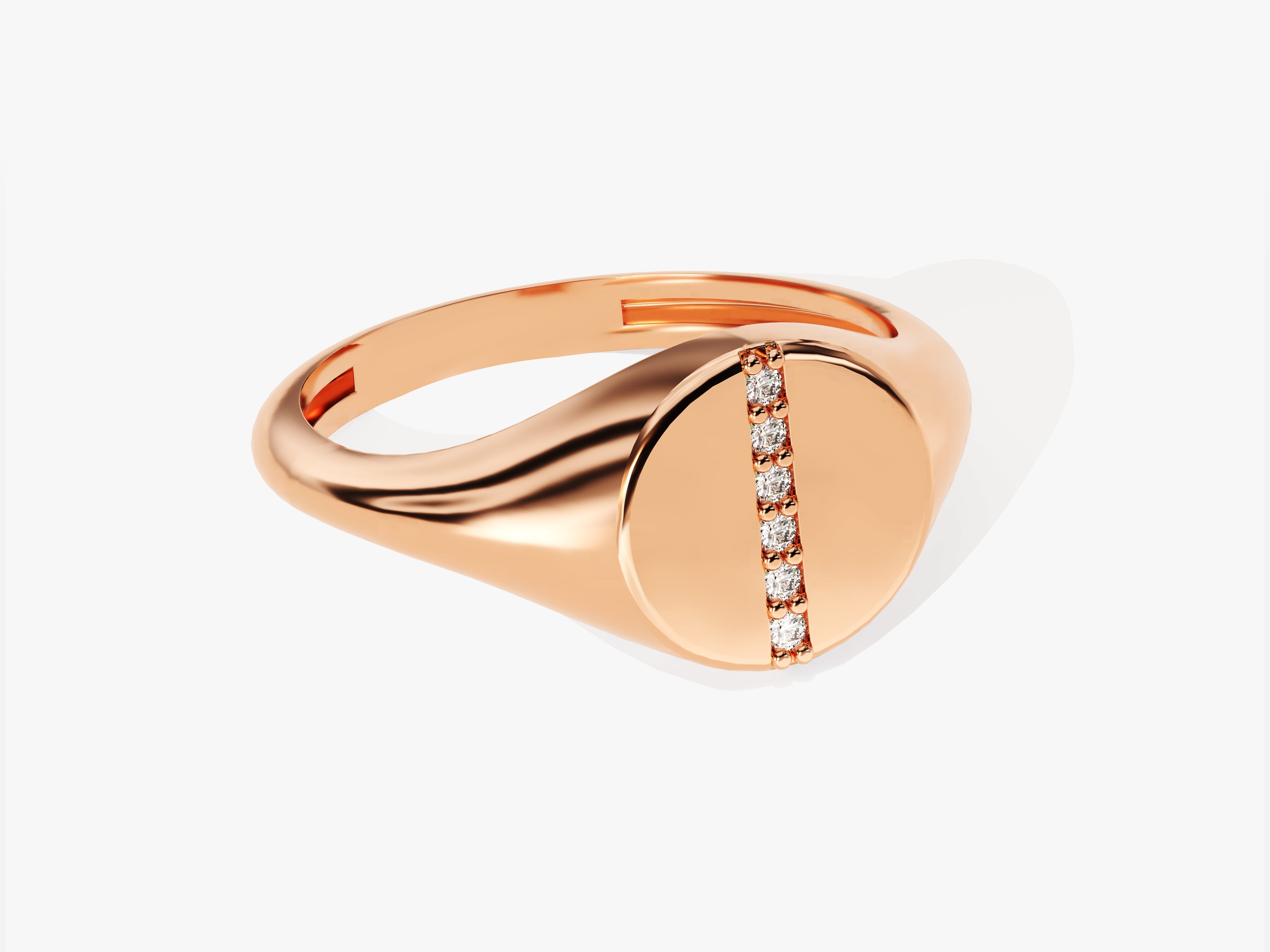 Rose gold signet ring with diamond accents from jewelry collection