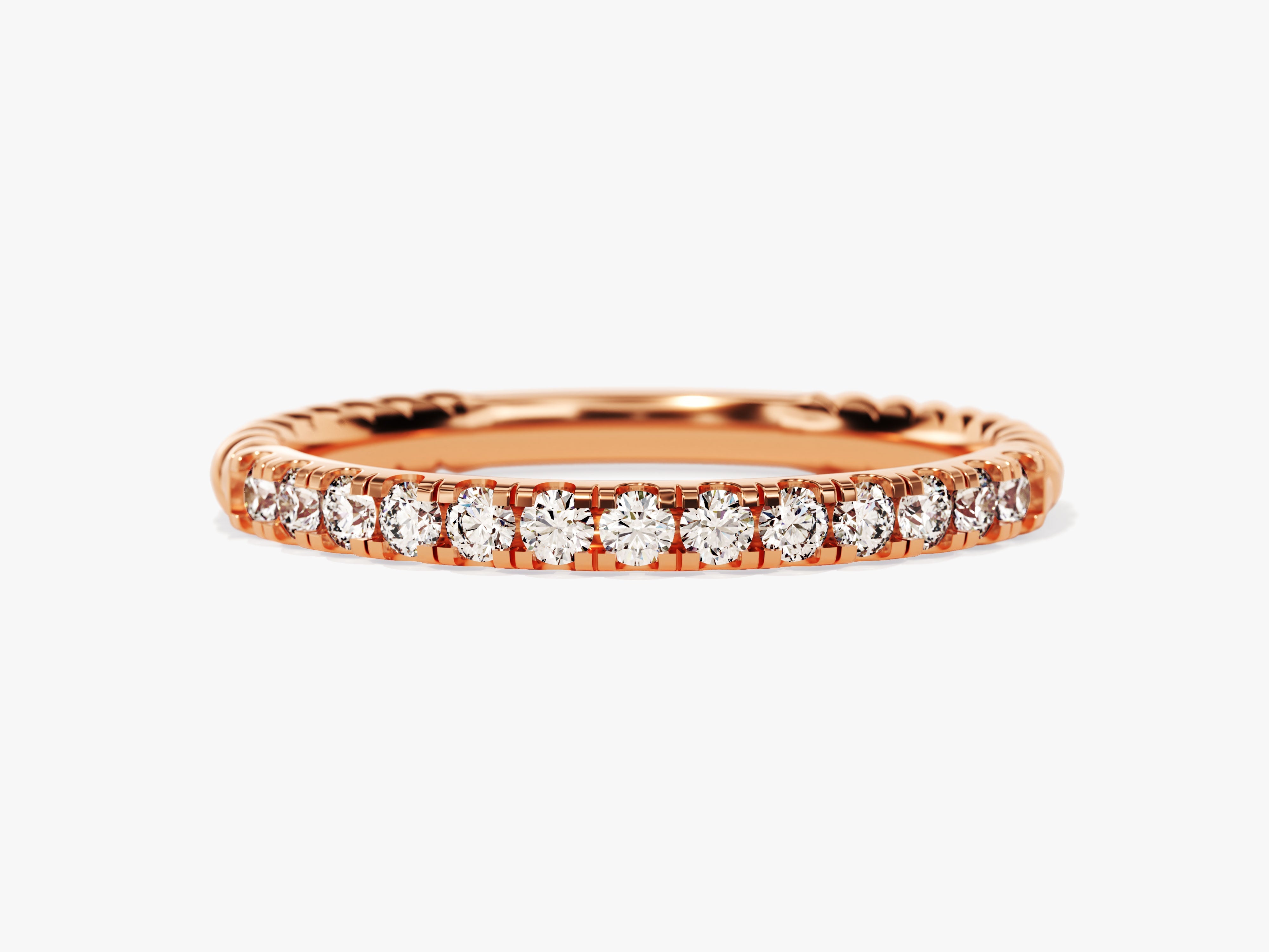 Rose gold diamond eternity ring with twisted band detail