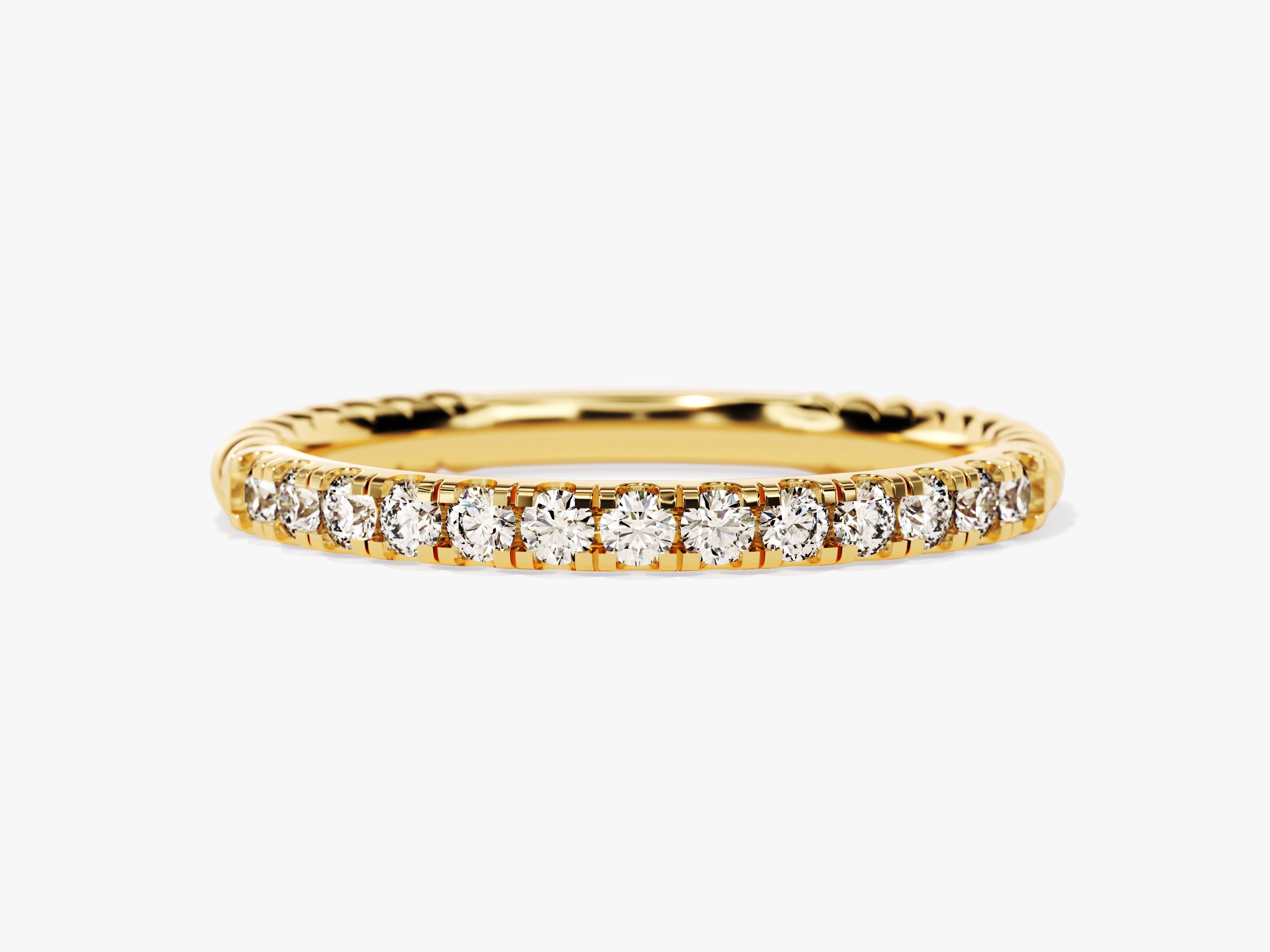 Gold diamond eternity ring with twisted band detail