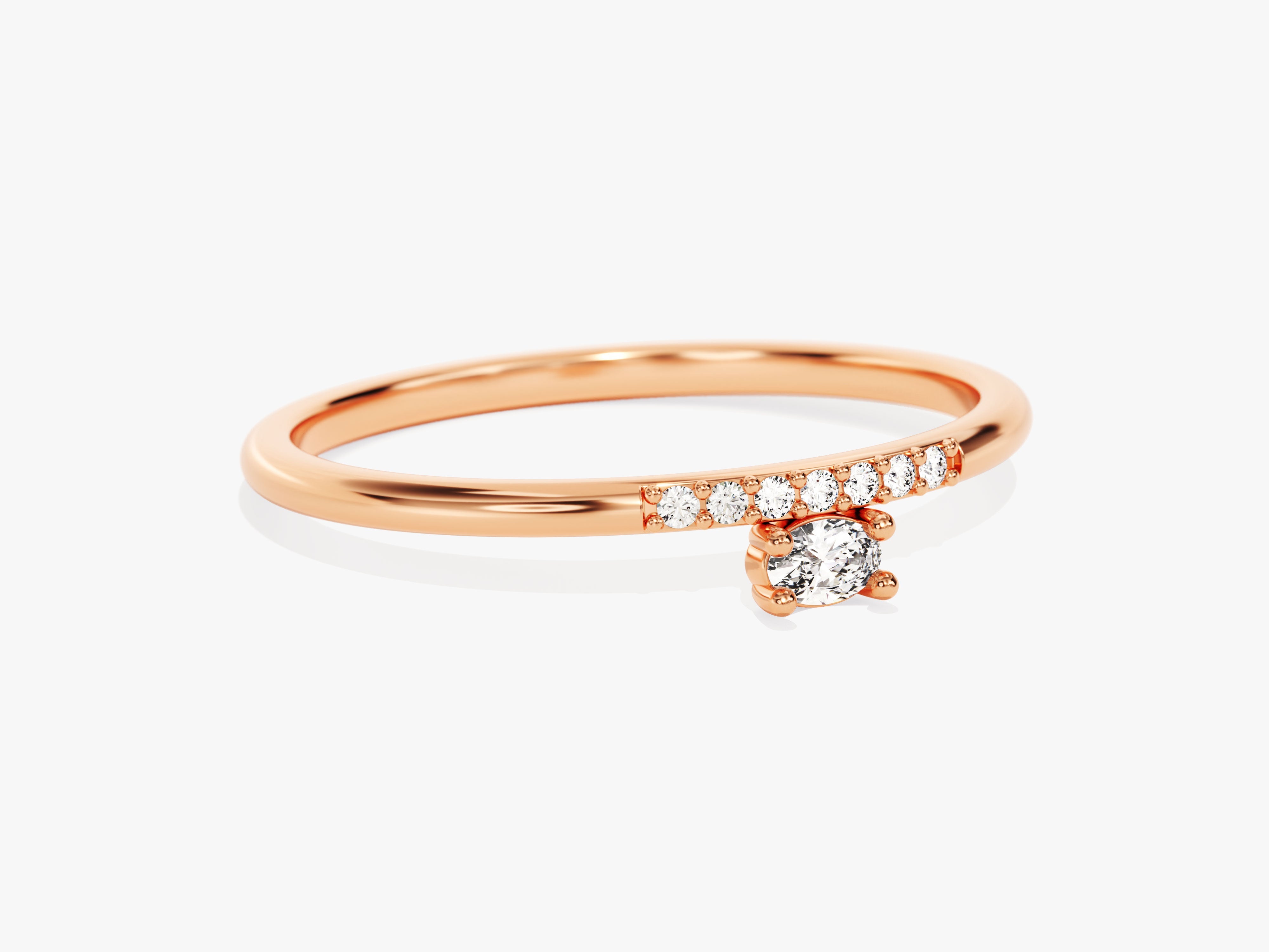 Rose gold diamond ring with a dangling center stone